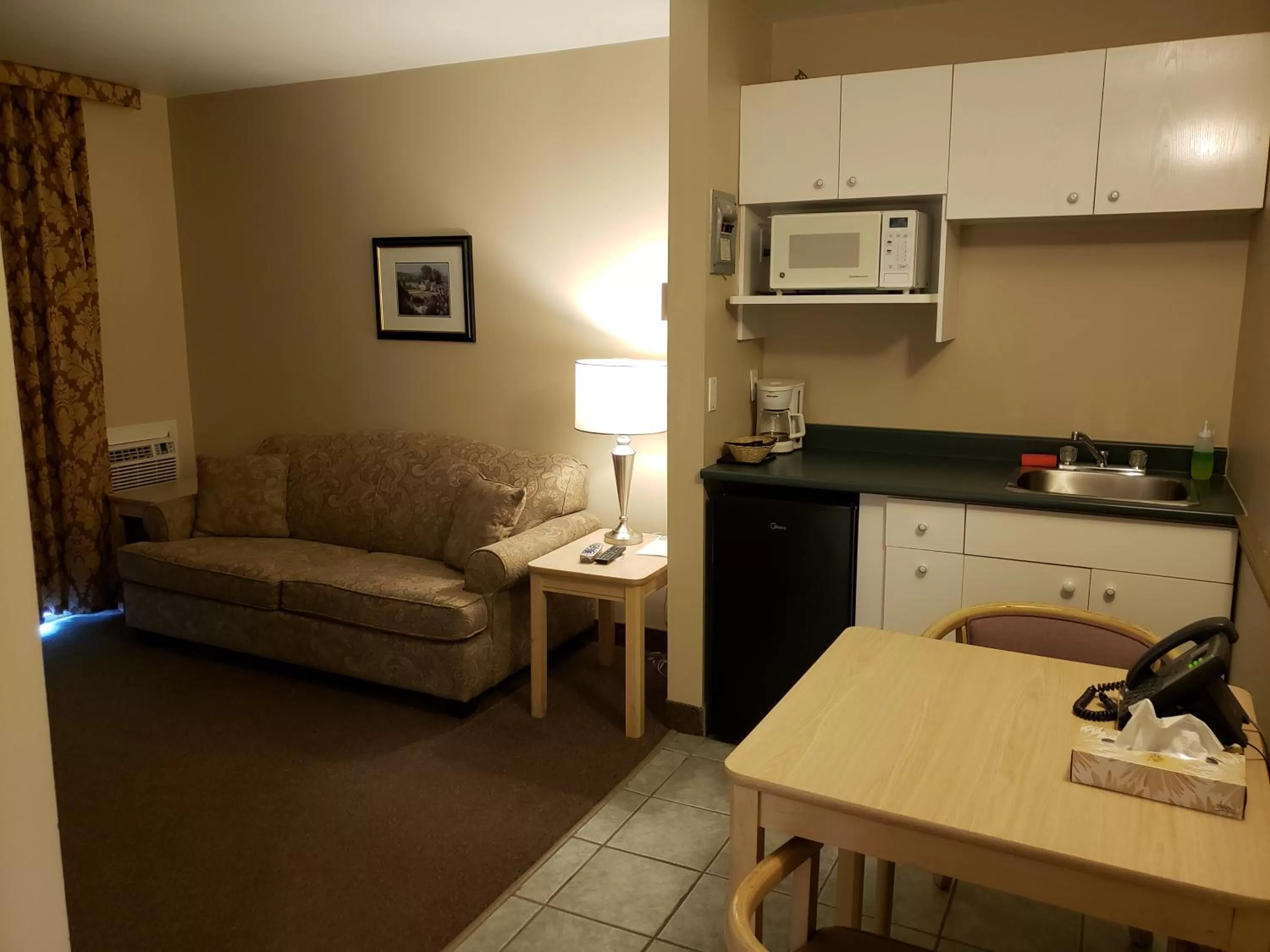 Kitchen or kitchenette in Shemron Suites Hotel