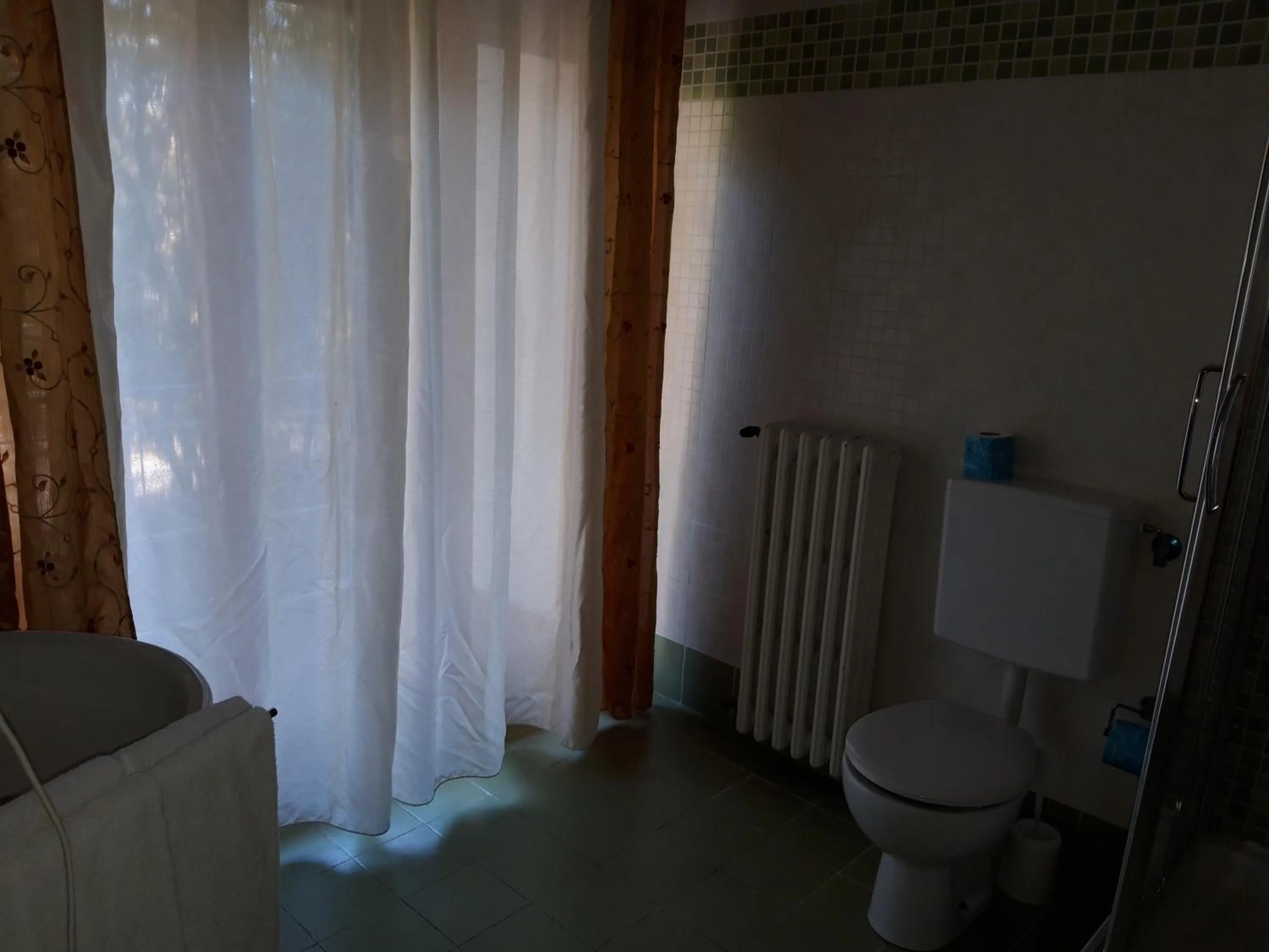 Bathroom in Hotel Arcadia