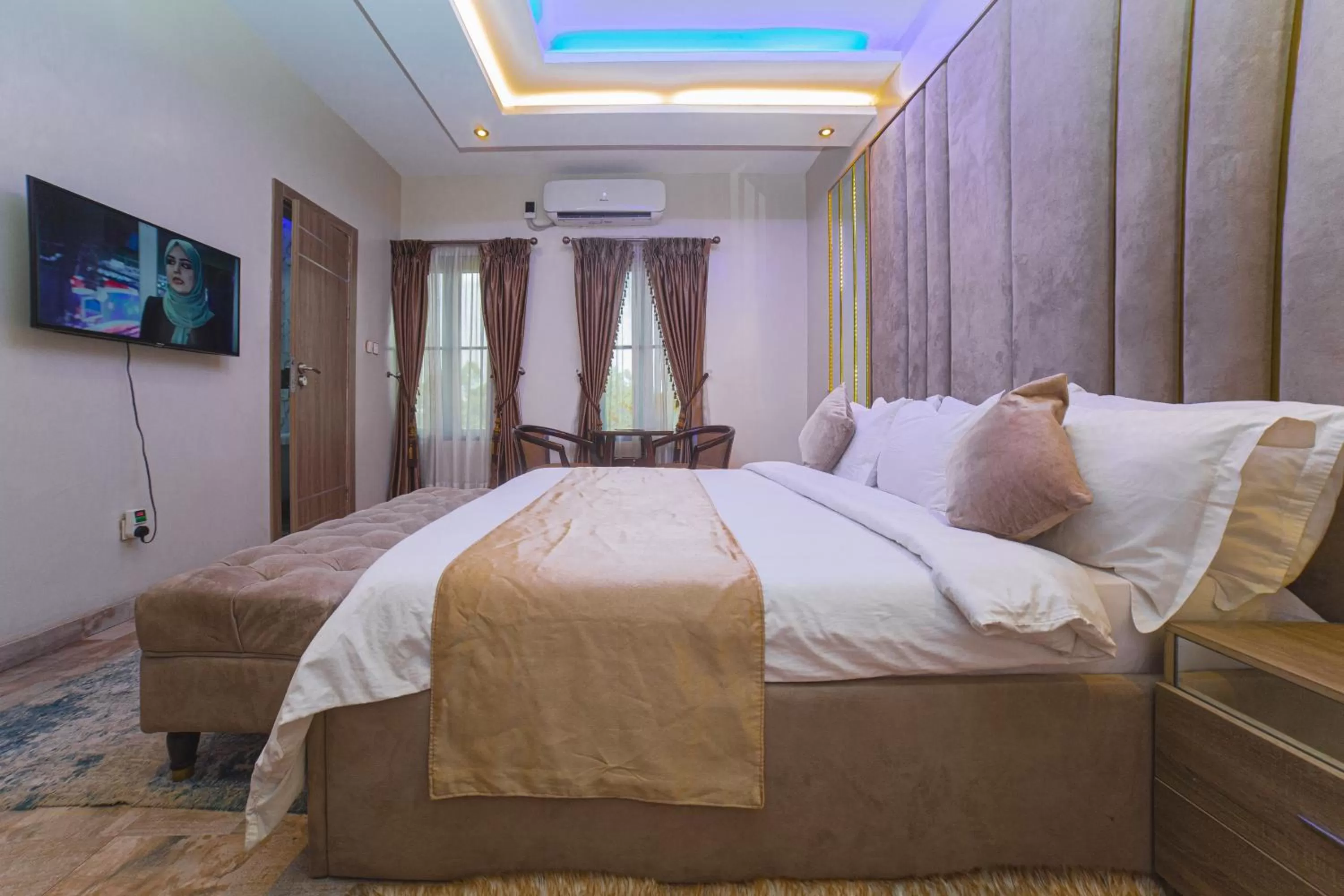 Photo of the whole room, Bed in God's Touch Apartments Signature