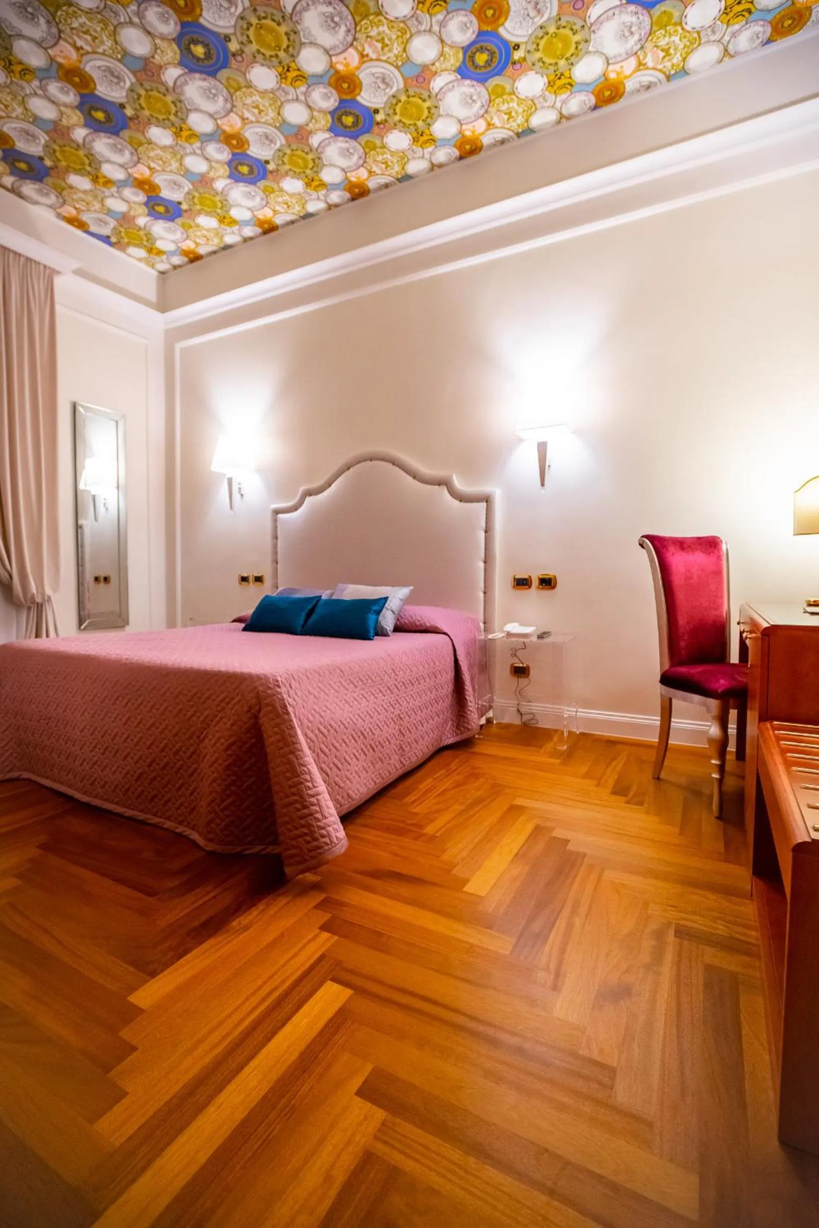 Bed in Boutique Hotel Puccini
