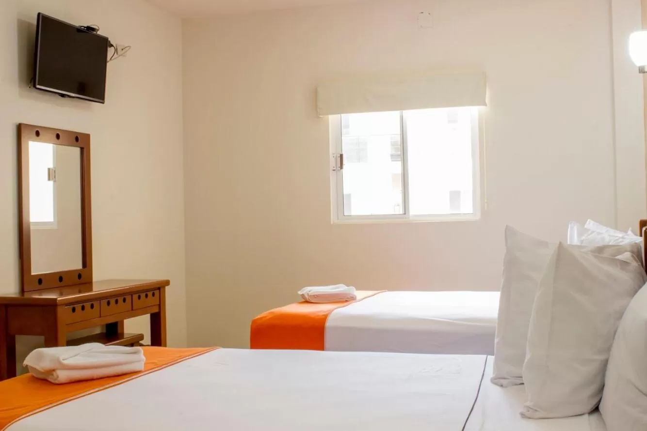 Bedroom, Bed in Gran Hotel Residencial Galerias