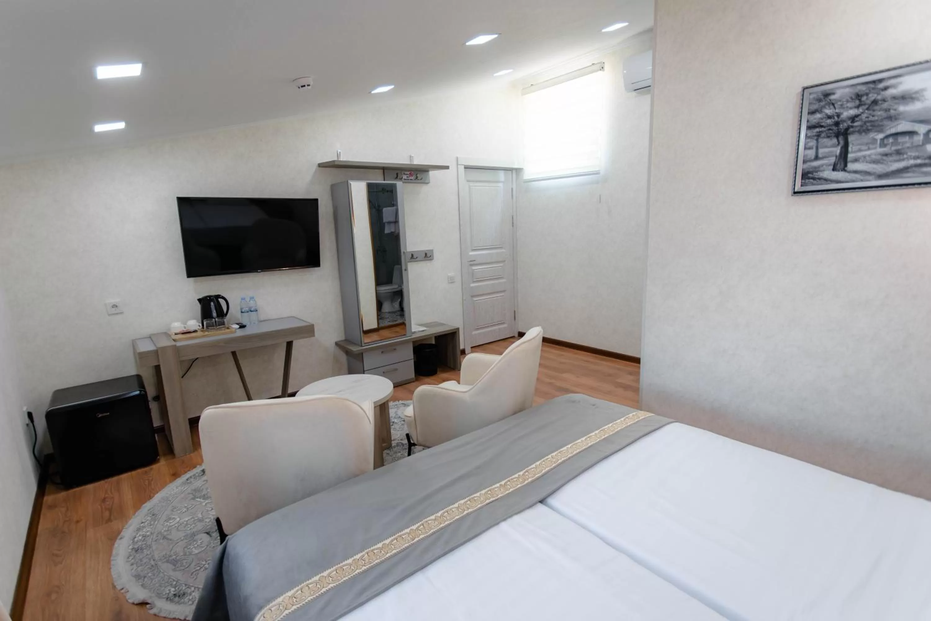 Bed in Registon Saroy Hotel