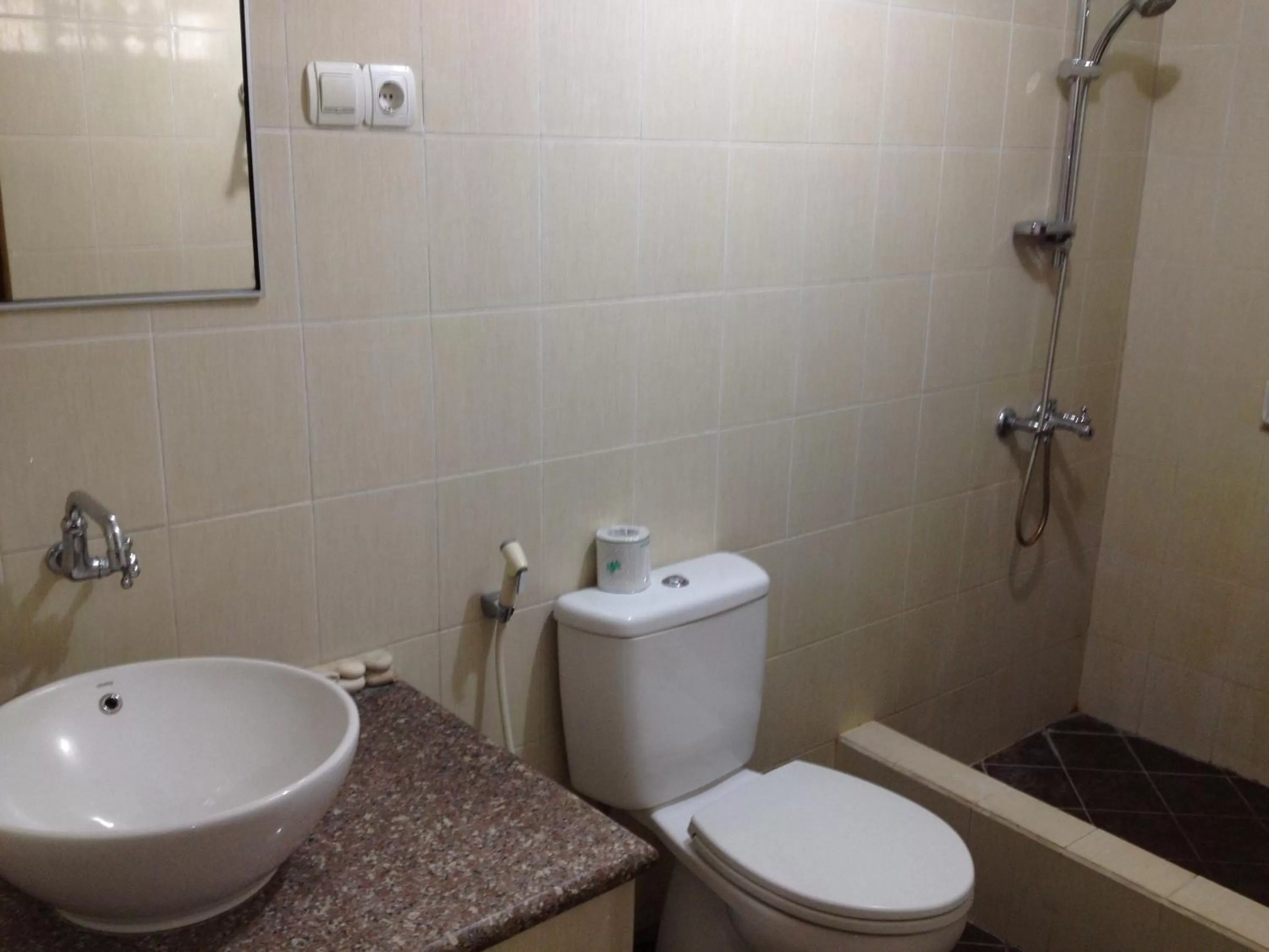 Bathroom in Astina Hotel