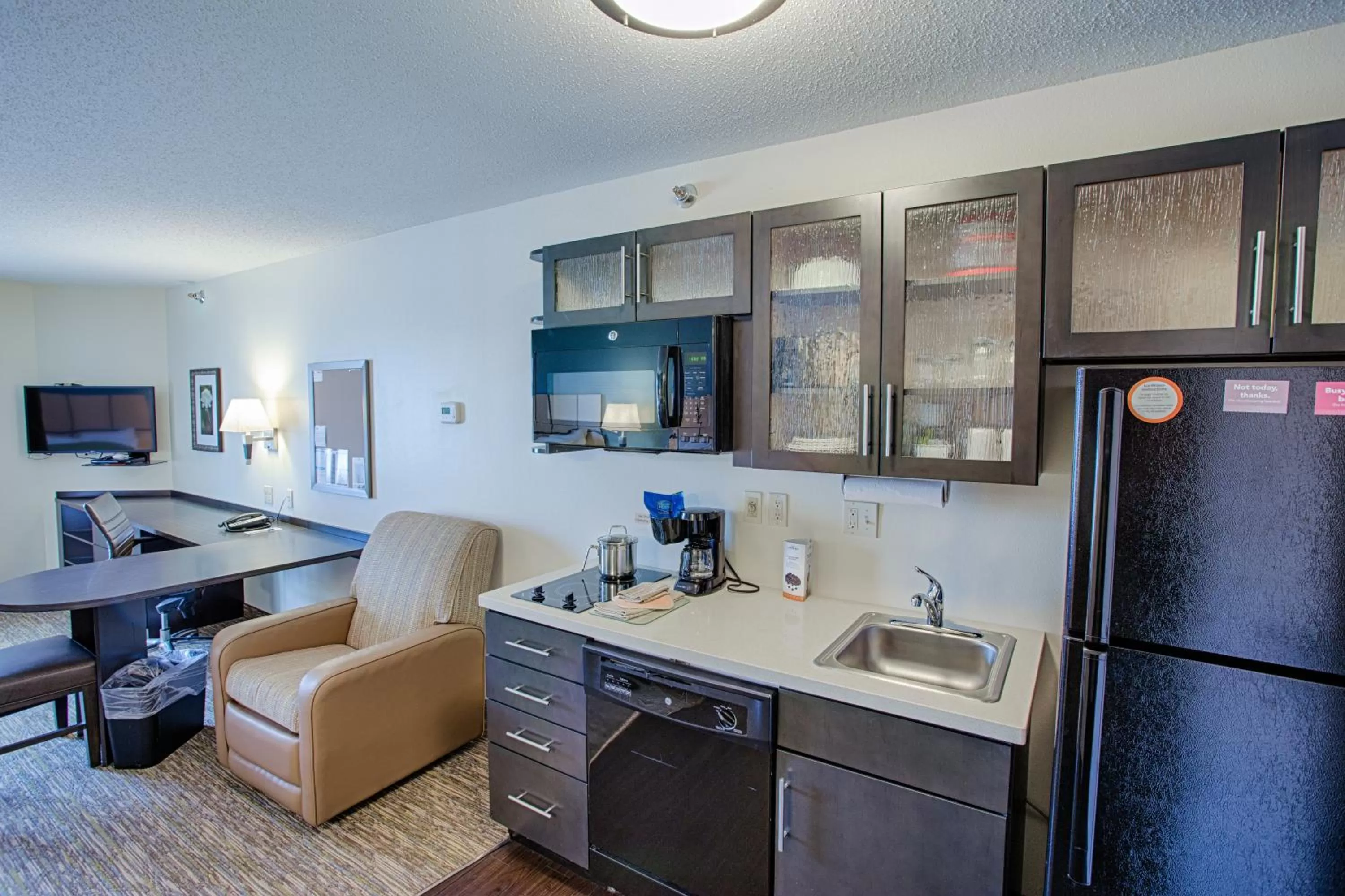 Bedroom in Candlewood Suites Fargo-North Dakota State University by IHG