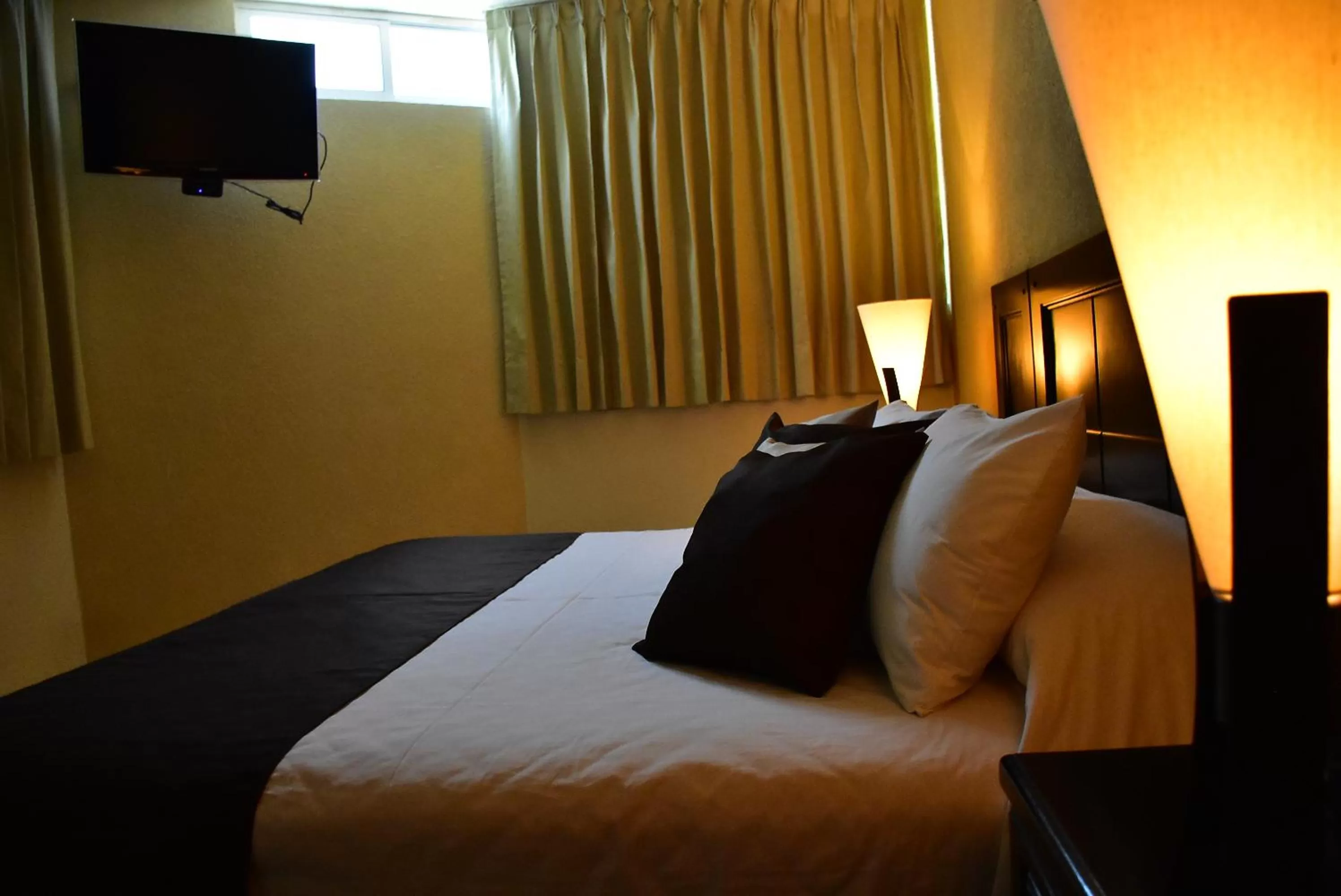 Bed in Hotel Suite Azomali