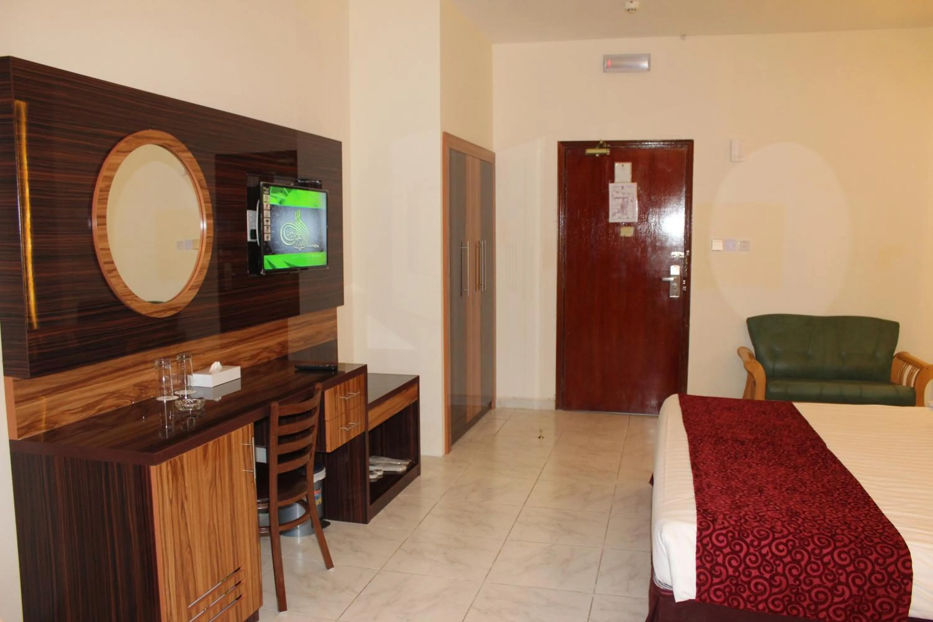 Bed in Grand Nova Hotel