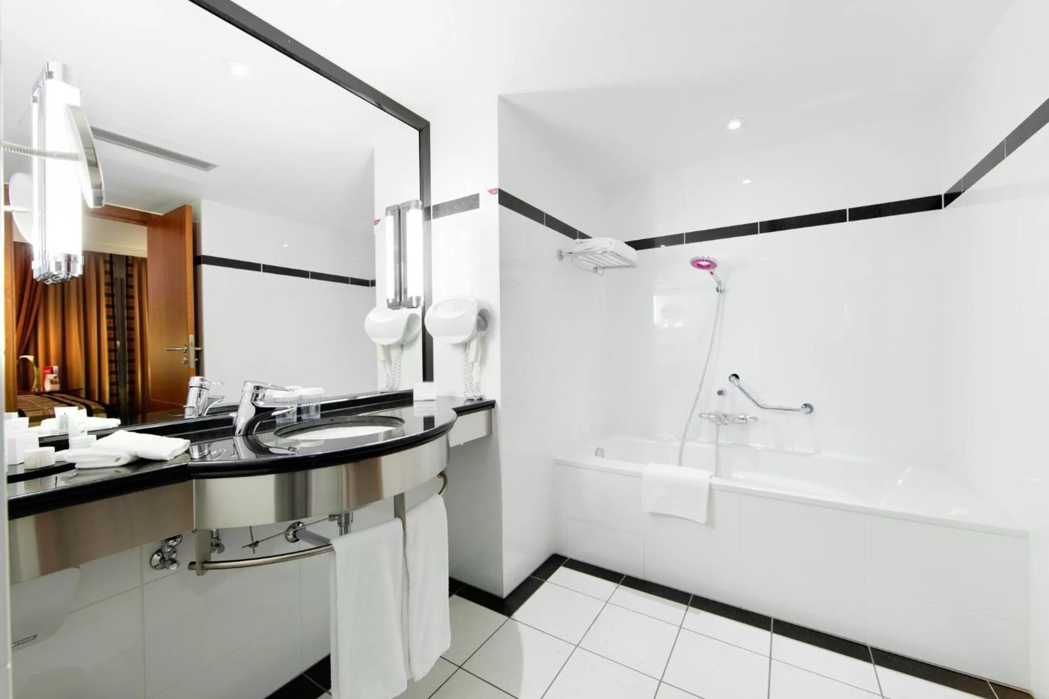 Bathroom in Crowne Plaza Brussels Airport by IHG