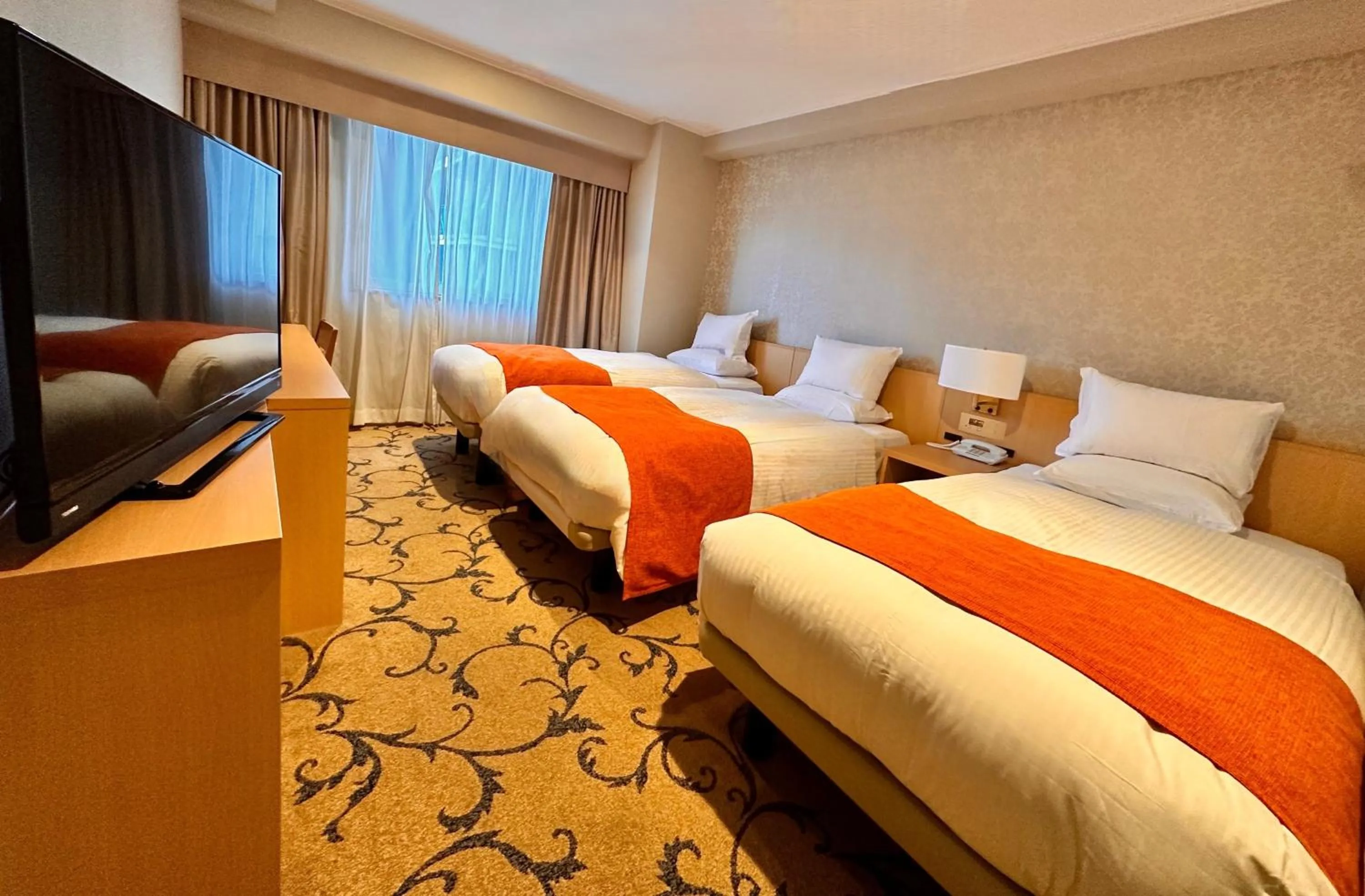 Bed in Hotel Rose Garden Shinjuku