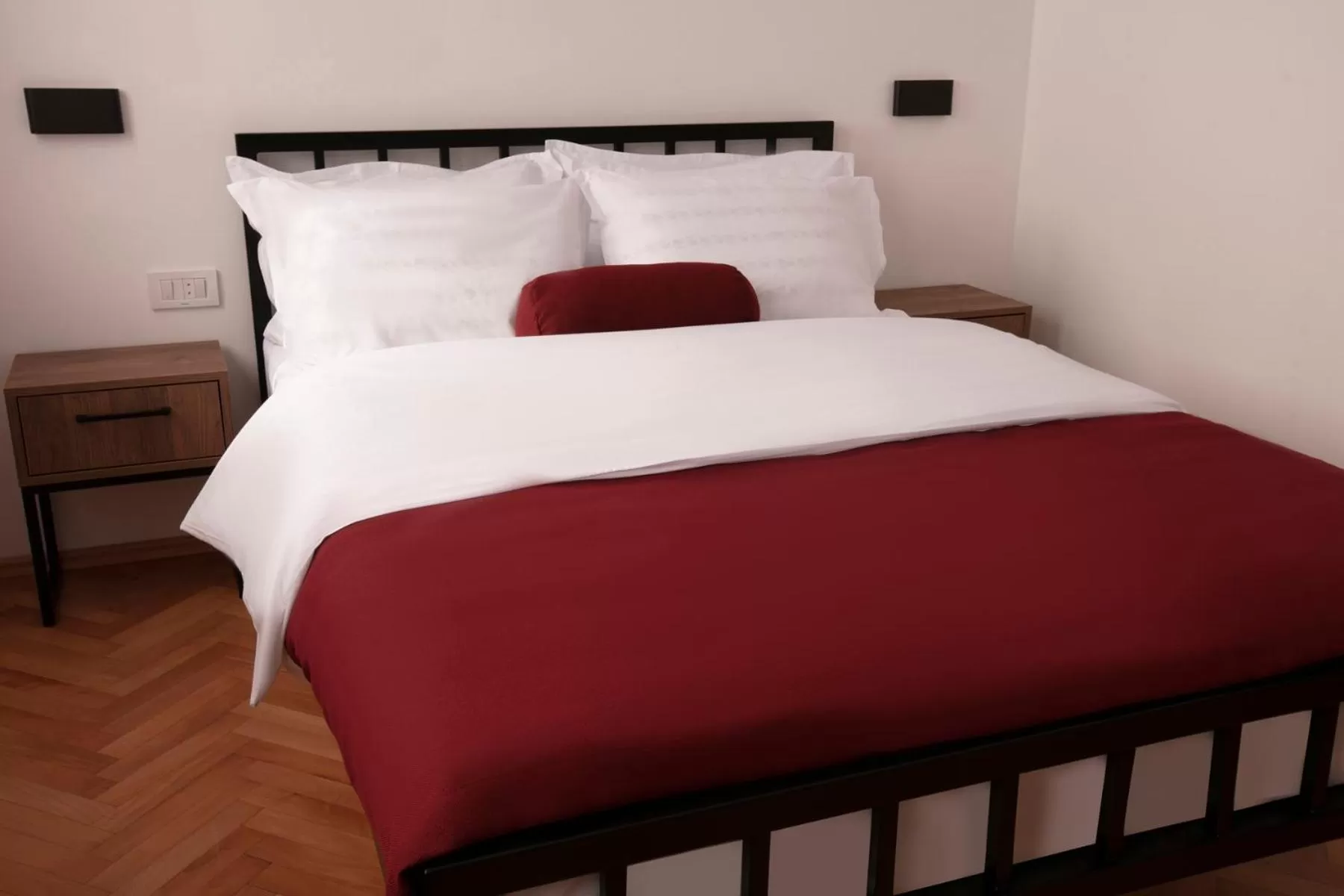 Bed in Grand Boutique Hotel