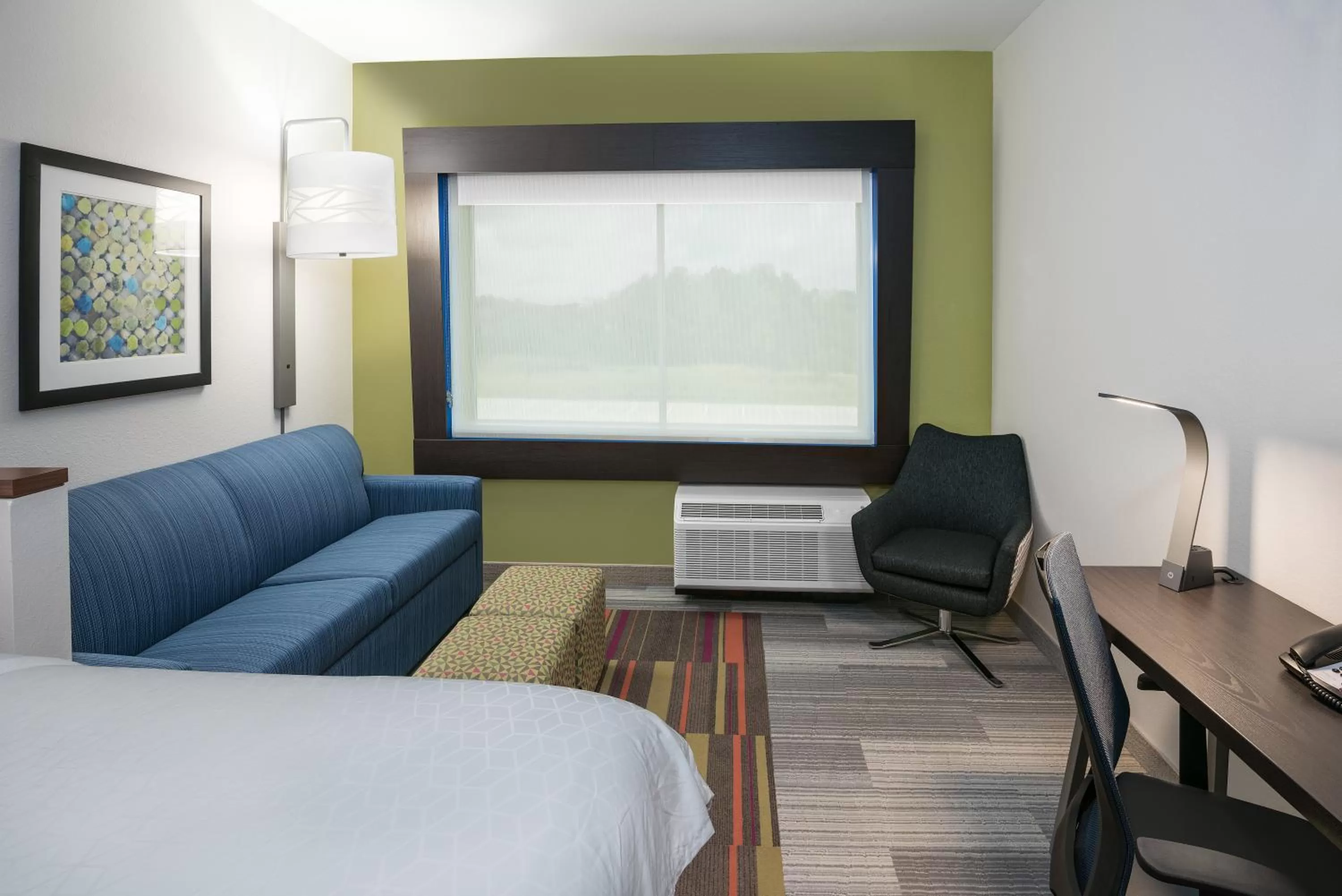Living room, Bed in Holiday Inn Express & Suites Bryan - College Station by IHG