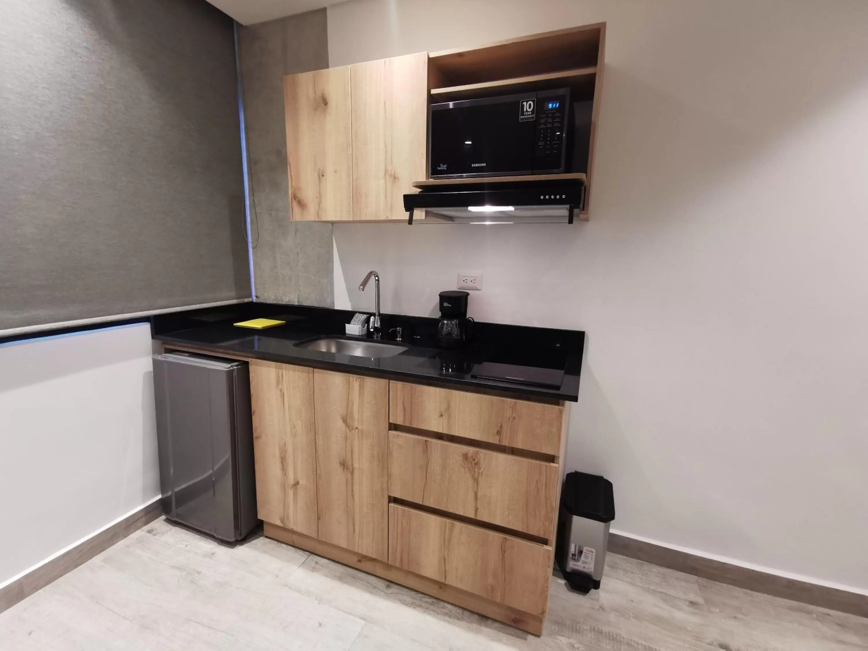 Kitchen or kitchenette in Eutopiq Hotel