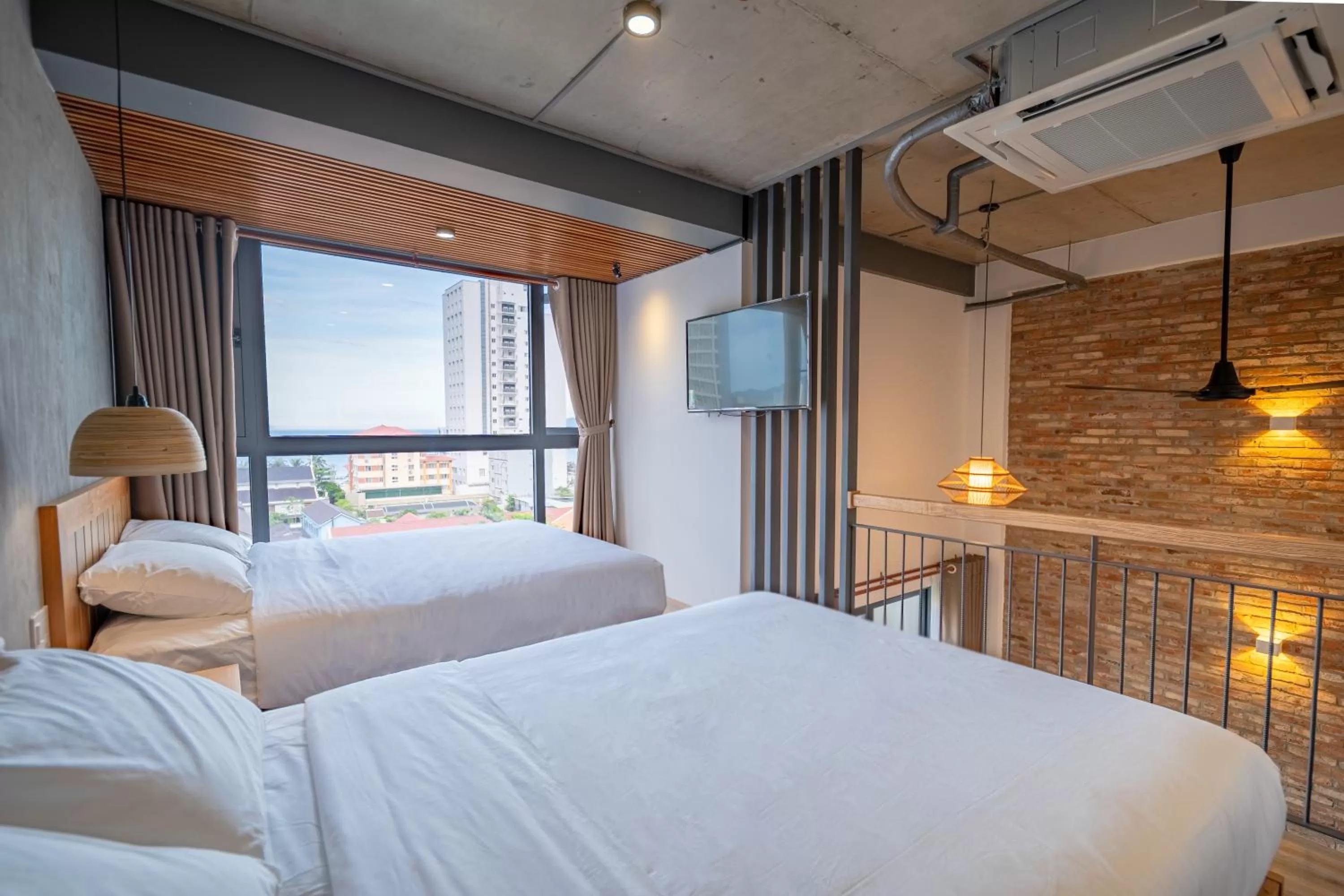 Bed in Coast House Boutique Hotel