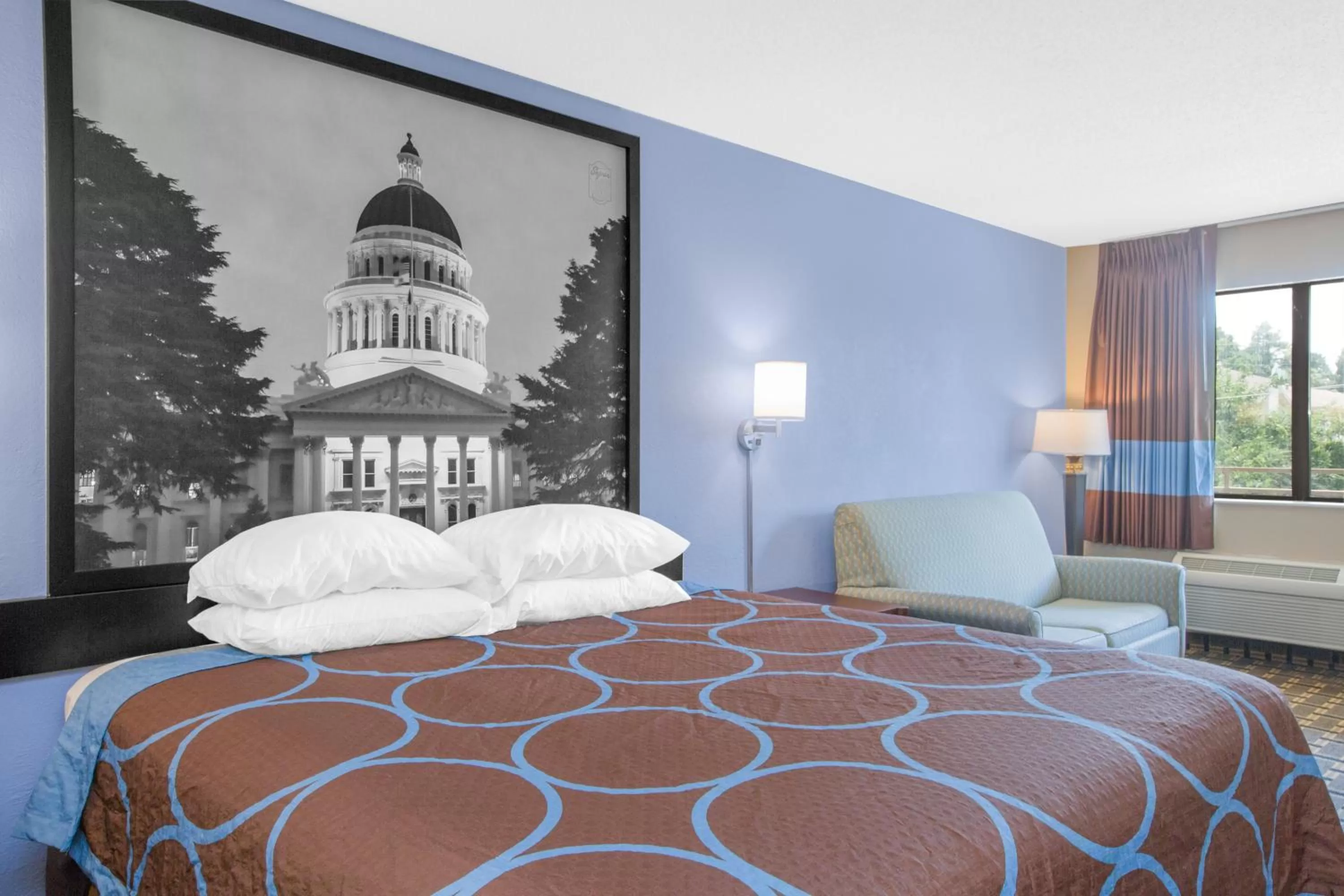 Bed in Super 8 by Wyndham Brinkley