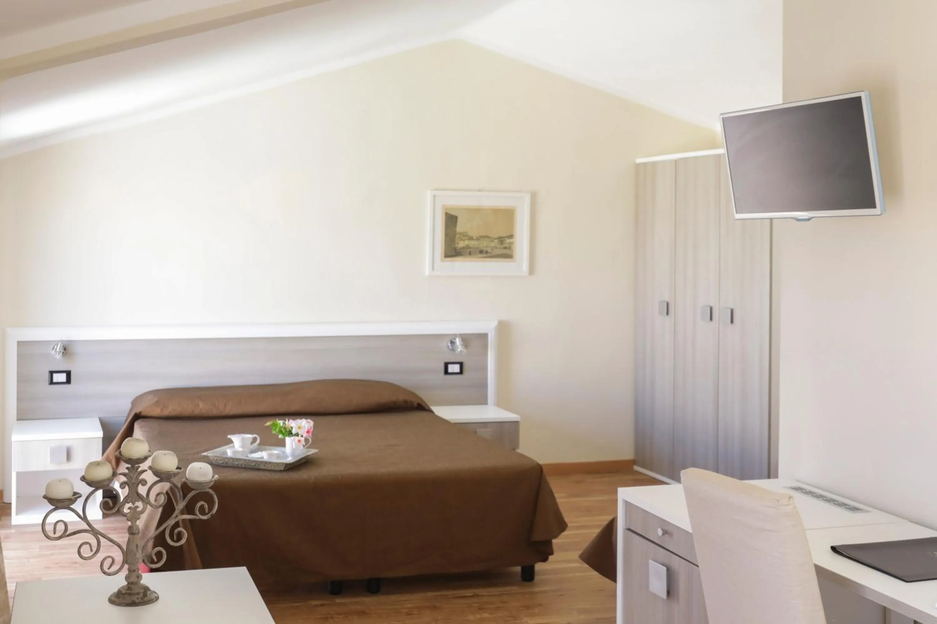 Bed in Hotel Fabricia