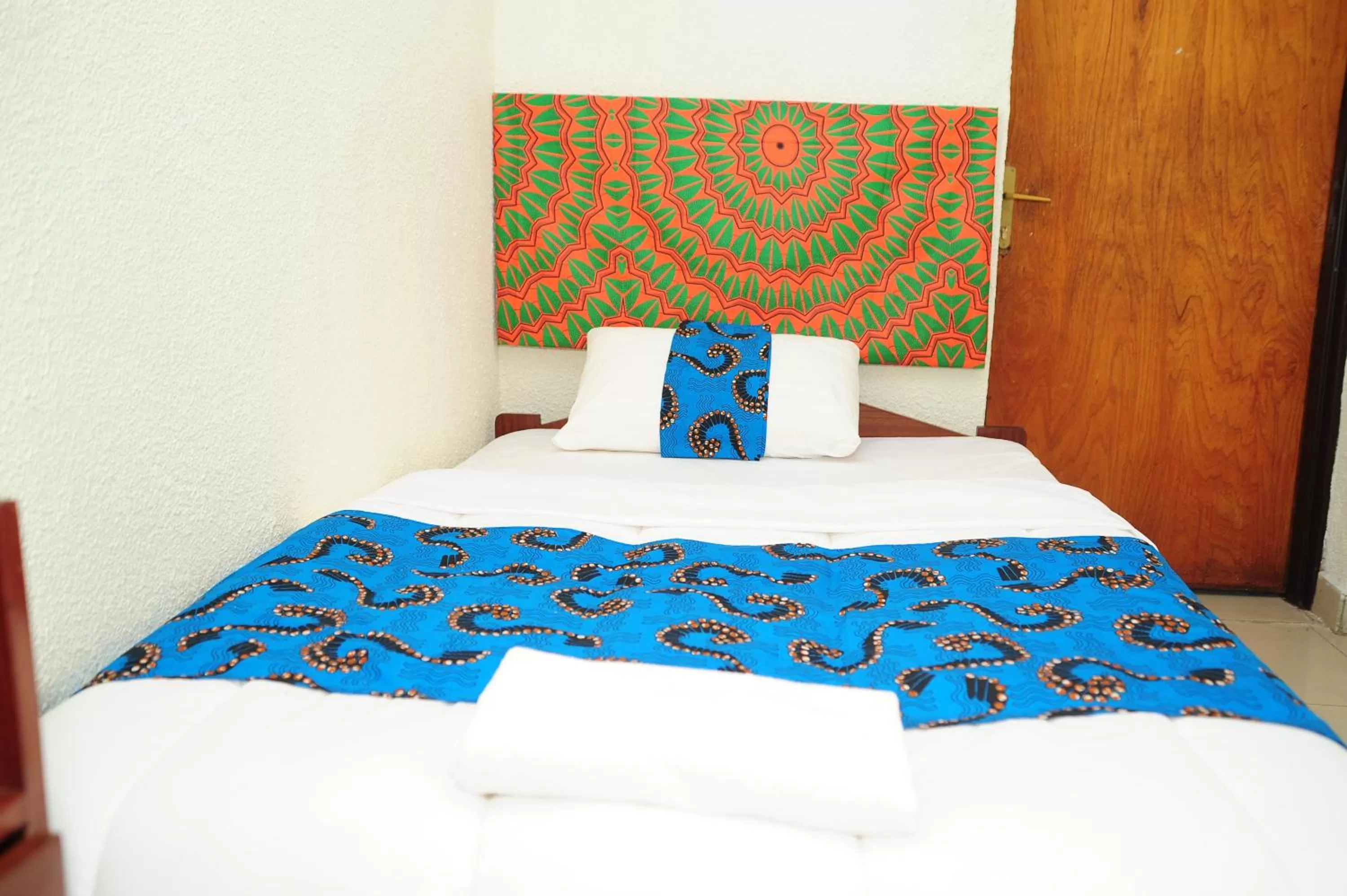 Bed in INZOZI AFRICA HOUSE B&B- Kacyiru