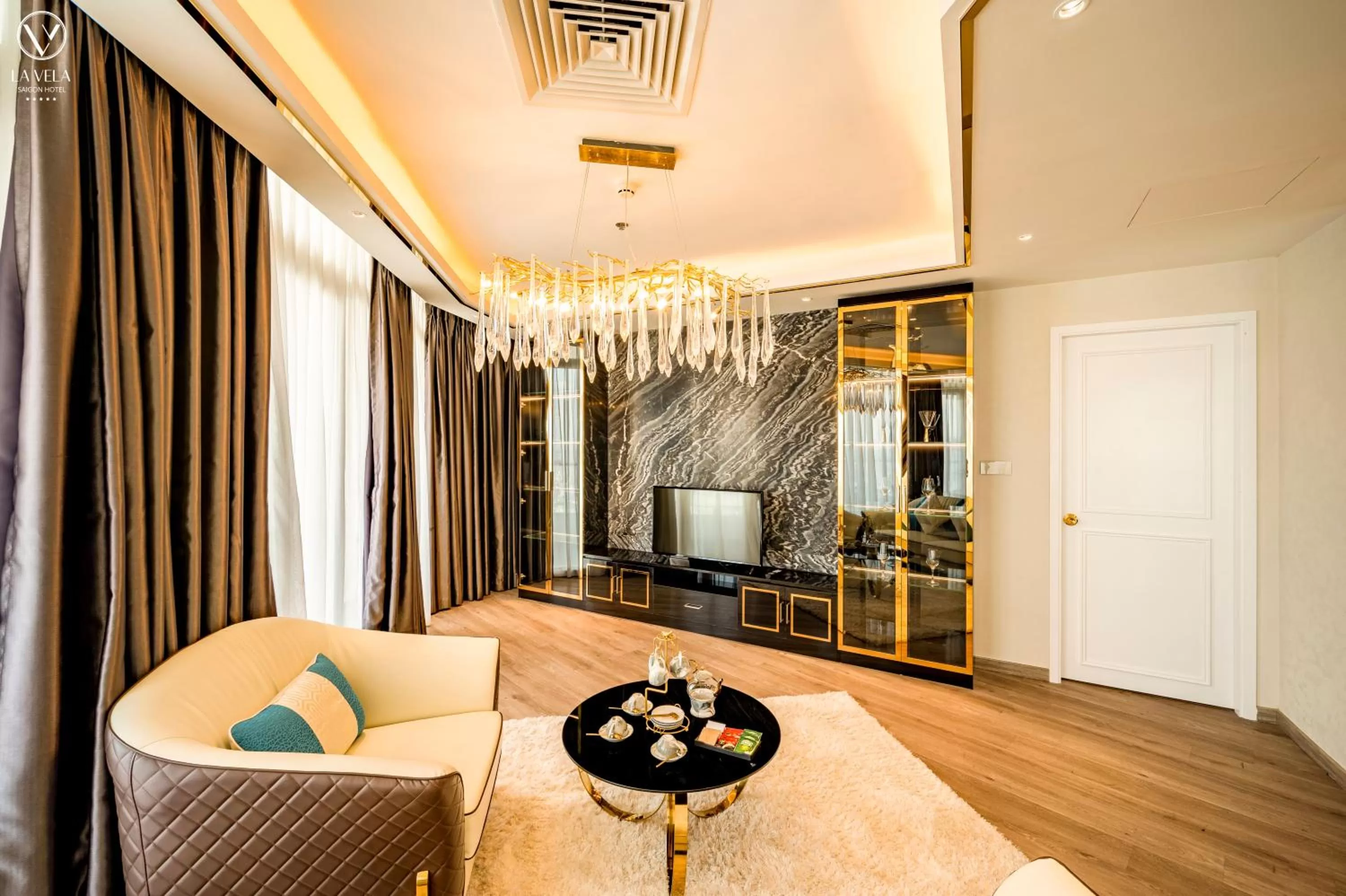 Living room in La Vela Saigon Hotel