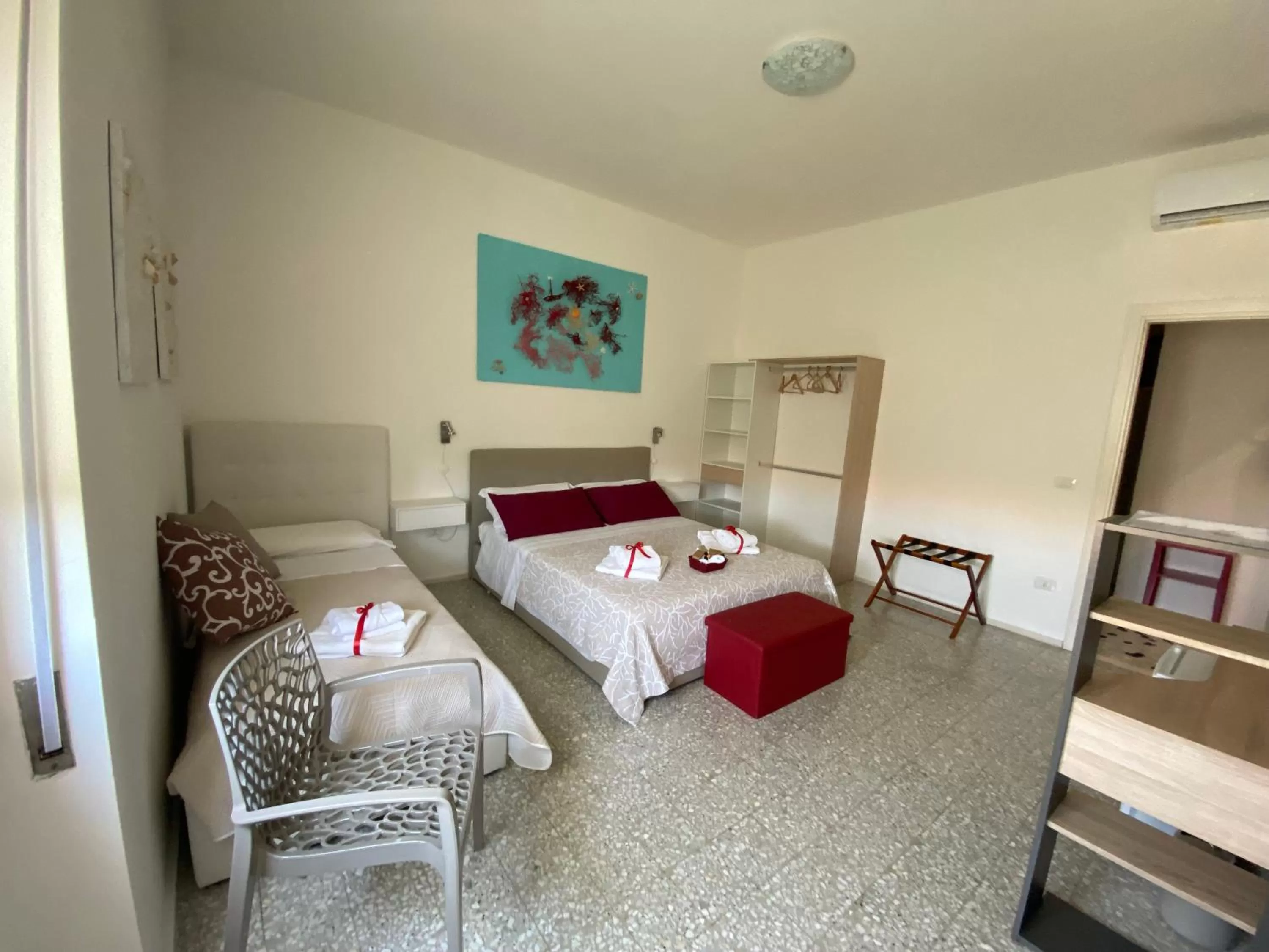 Bed in Rossocorallo Rooms