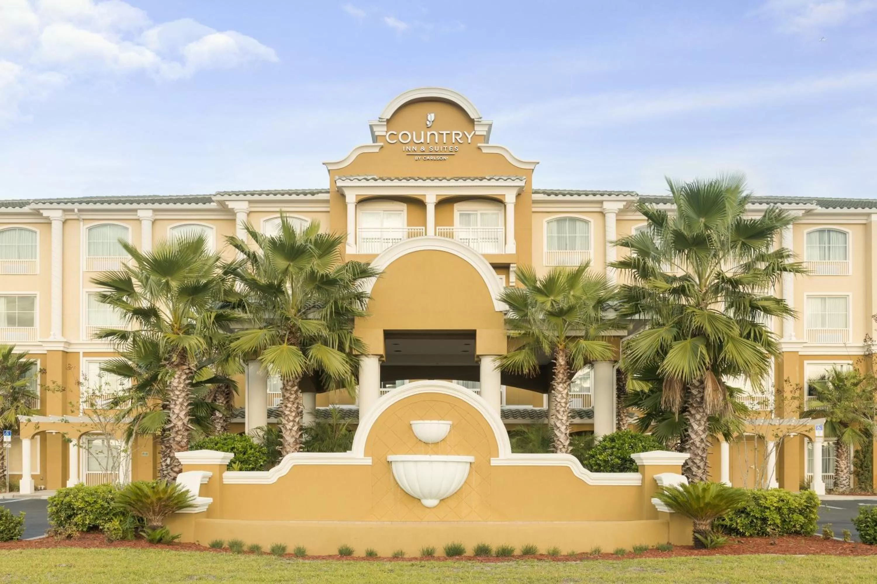 Property building in Country Inn & Suites by Radisson, Port Orange-Daytona, FL