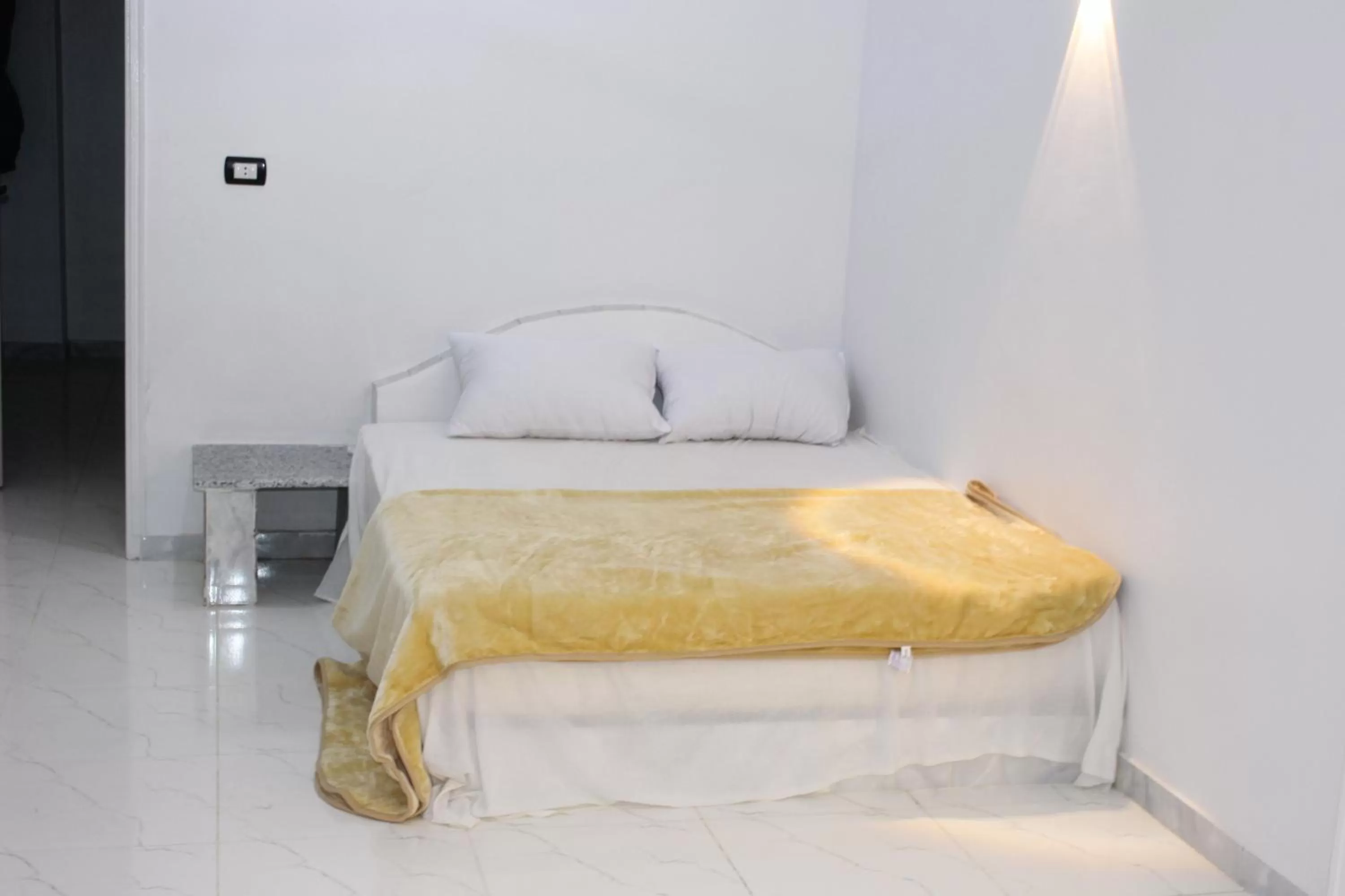 Bed in Mama Africa Apts & Studios