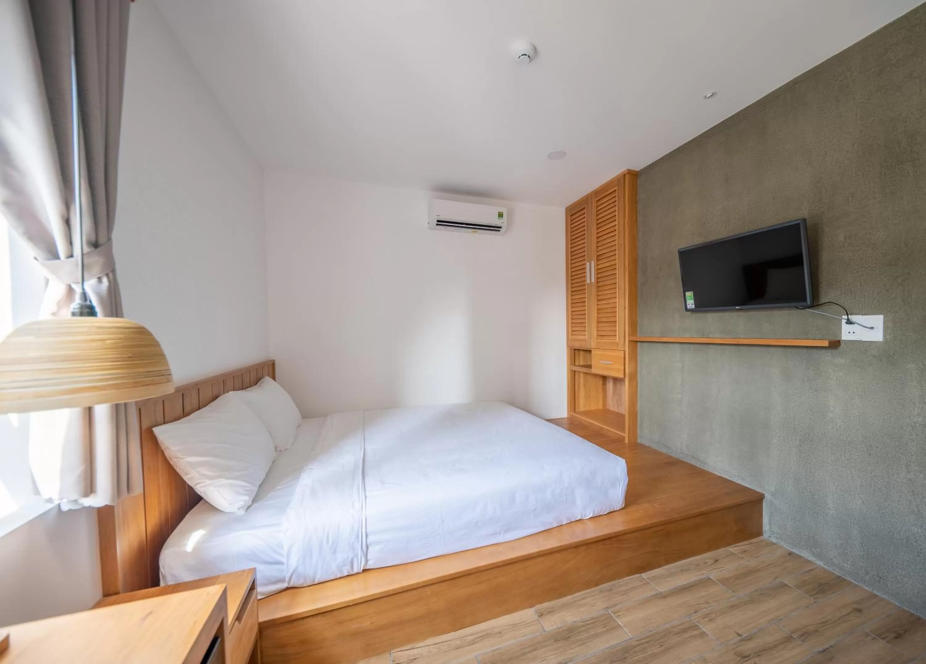 Bed in Coast House Boutique Hotel