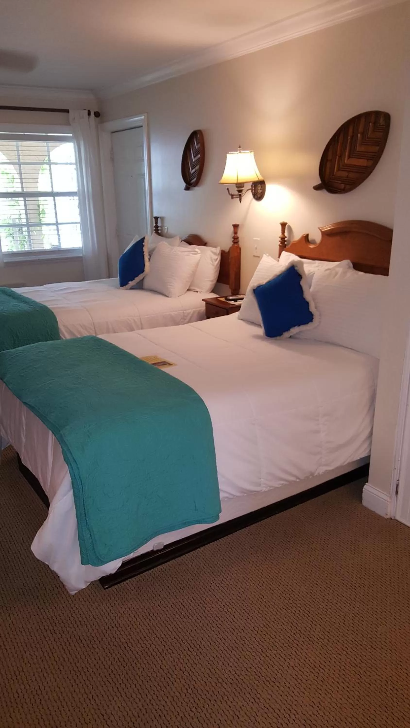 Bedroom, Bed in The Caribbean Court Boutique Hotel