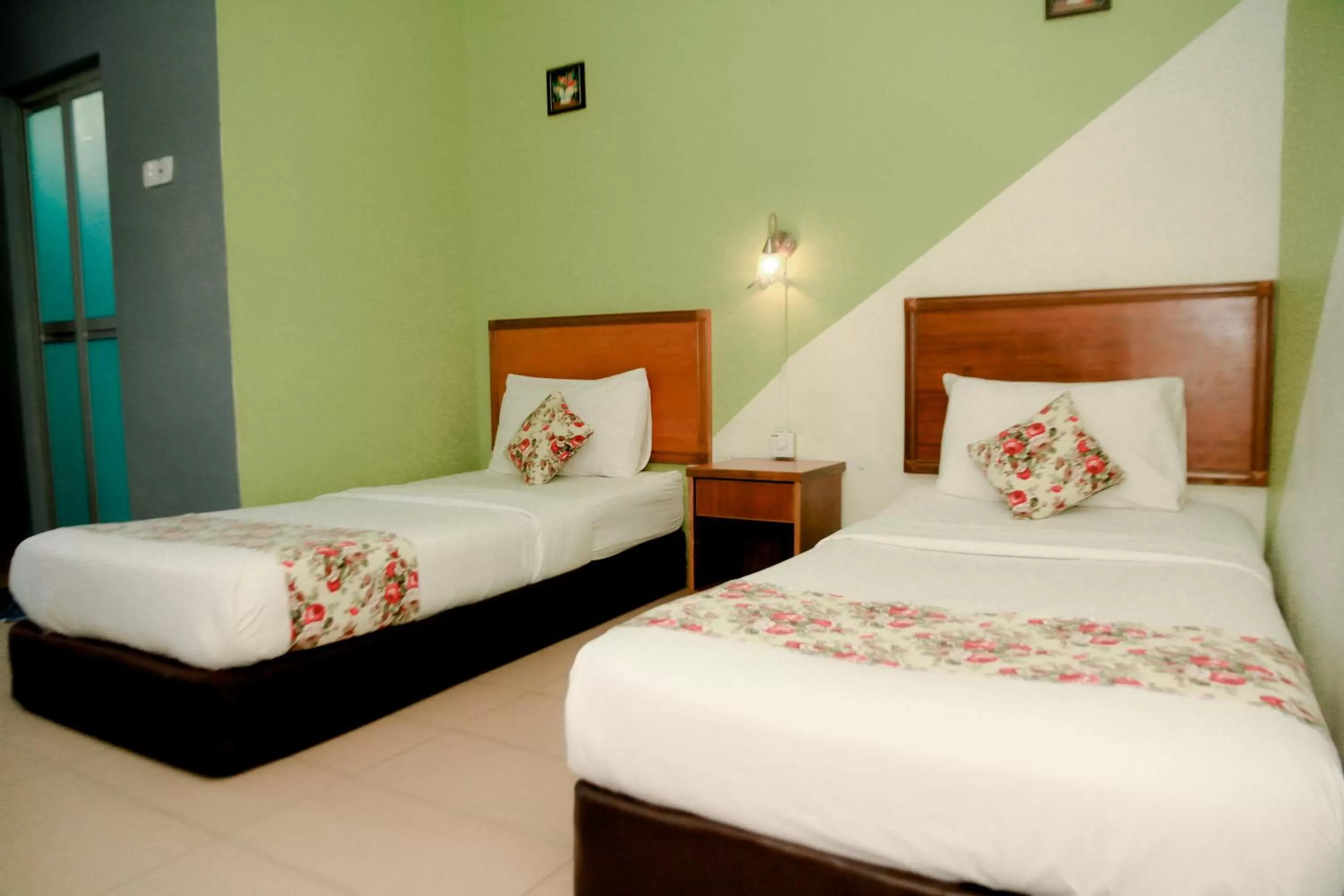 Bed in HOTEL D VIEW MERSING