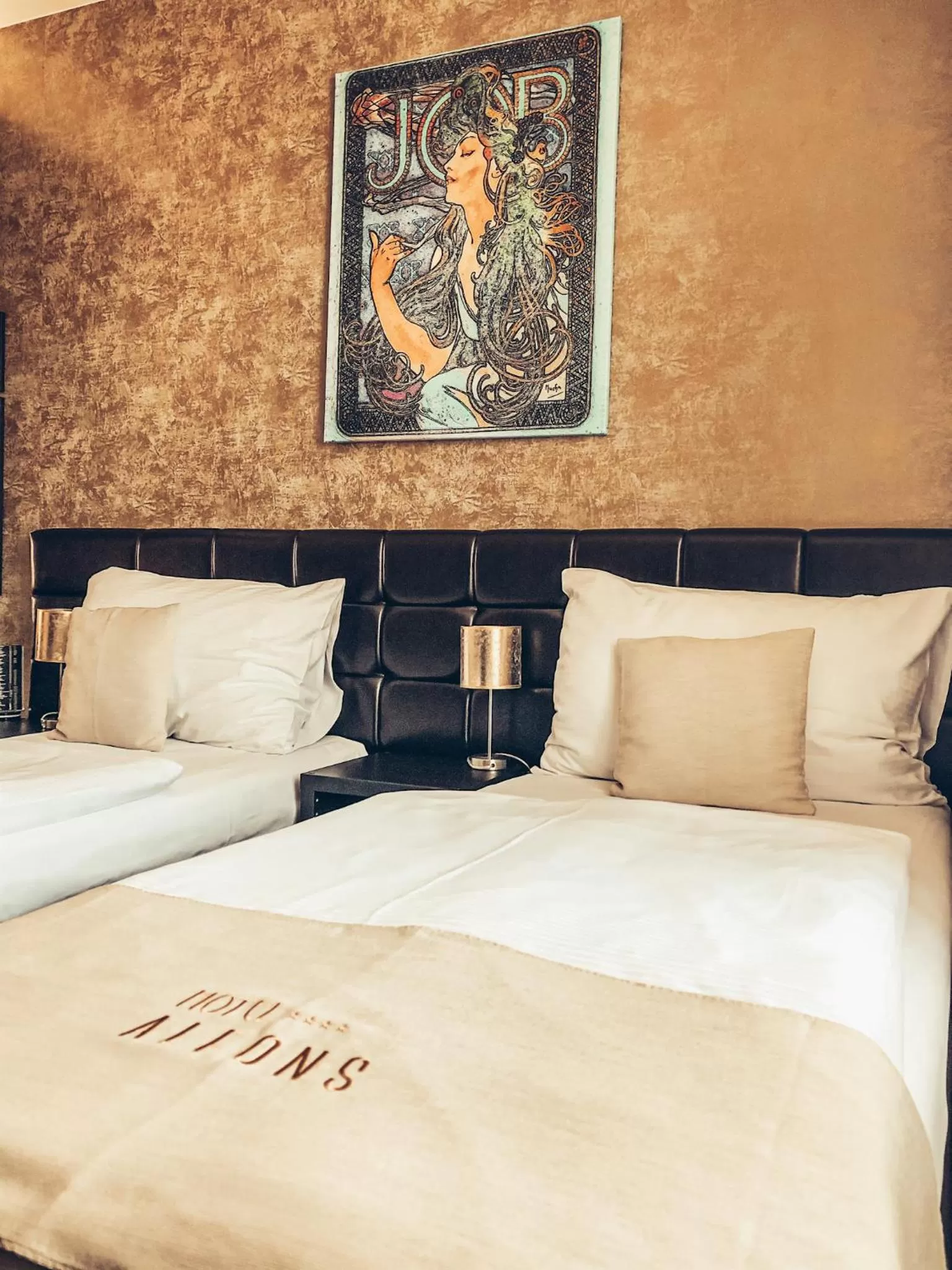 Bed in Alfons Boutique Hotel