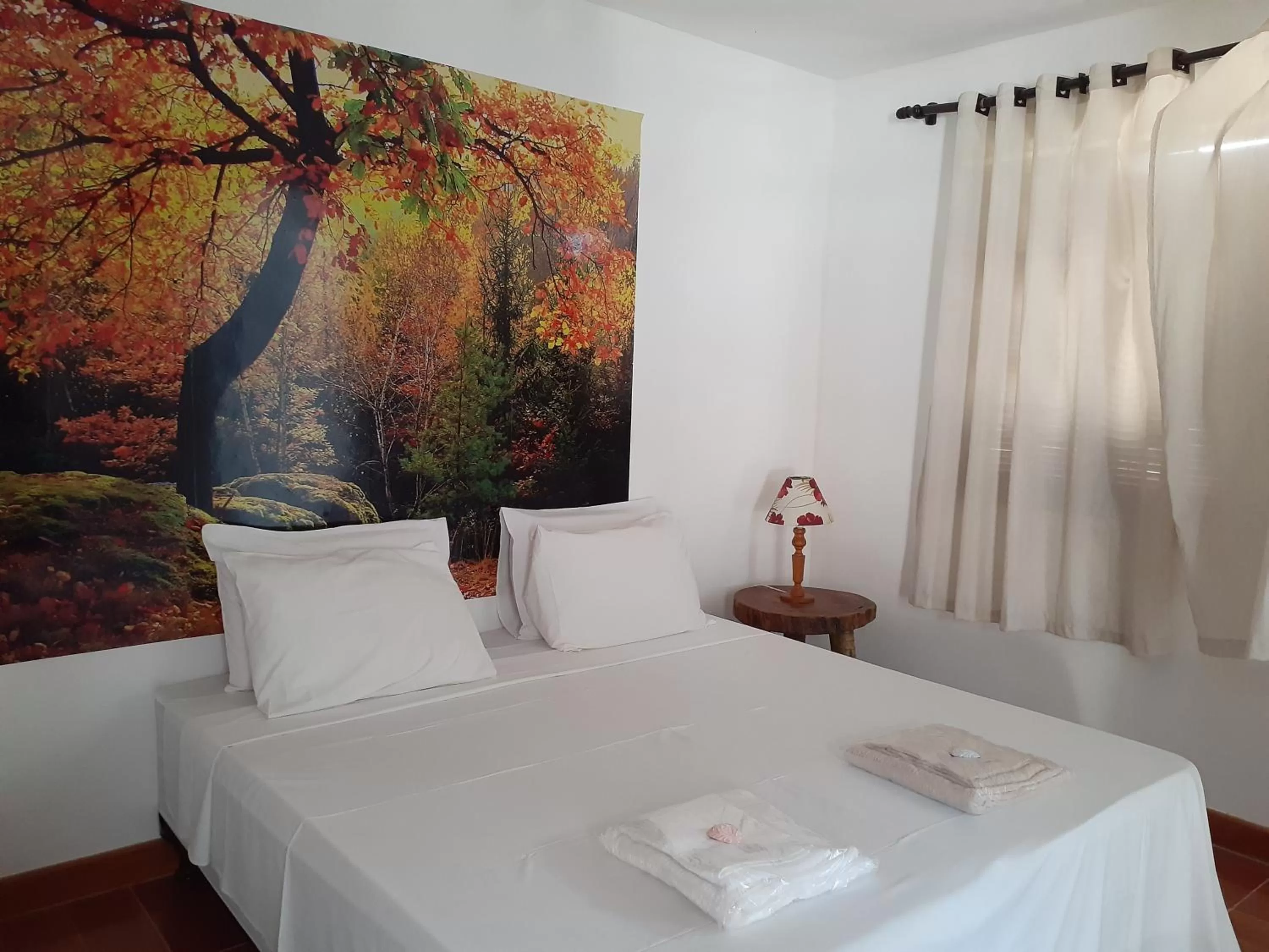 Bed in Pousada R.N.C. Nosso Paraíso