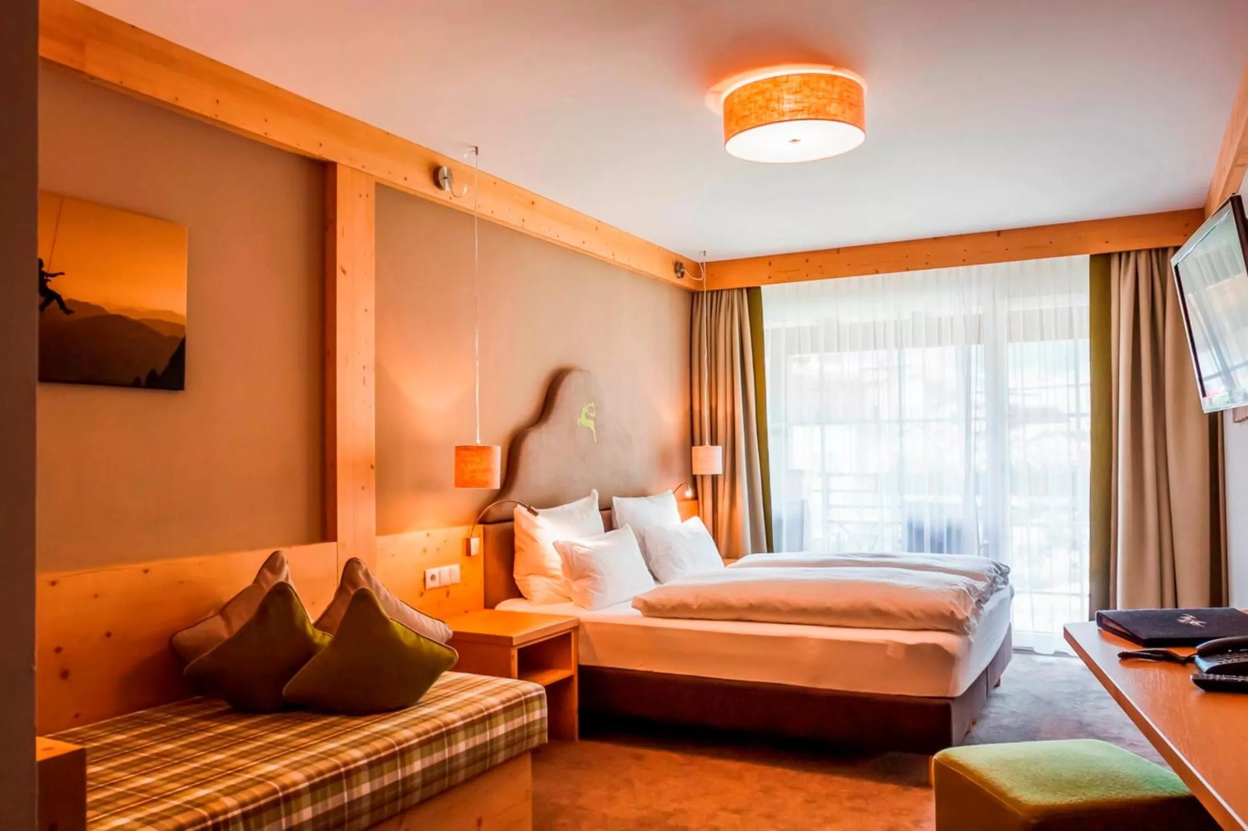 Photo of the whole room, Bed in Hotel Tirolerhof 4 Sterne Superior