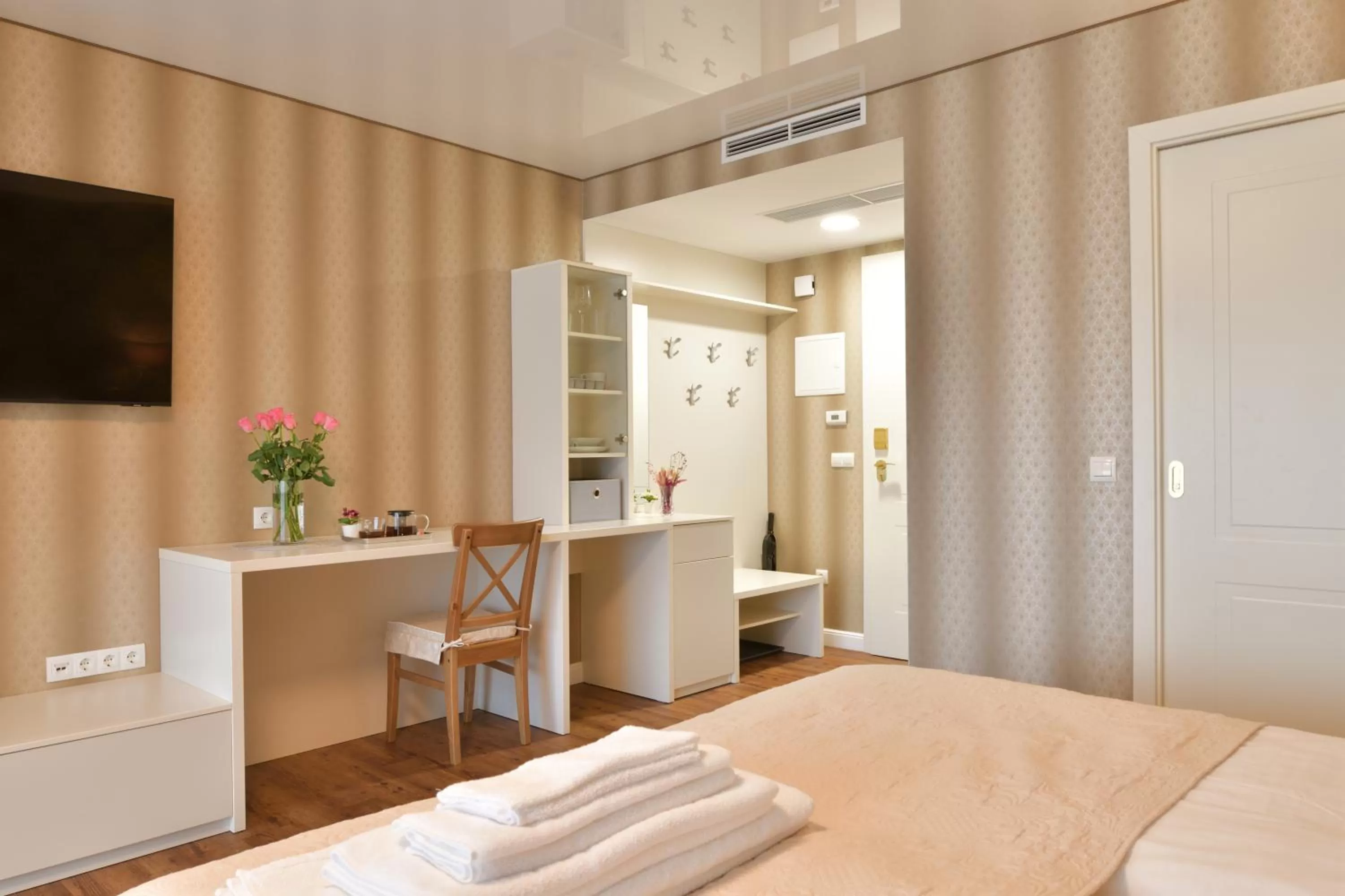 Photo of the whole room, Bed in TI Hotel