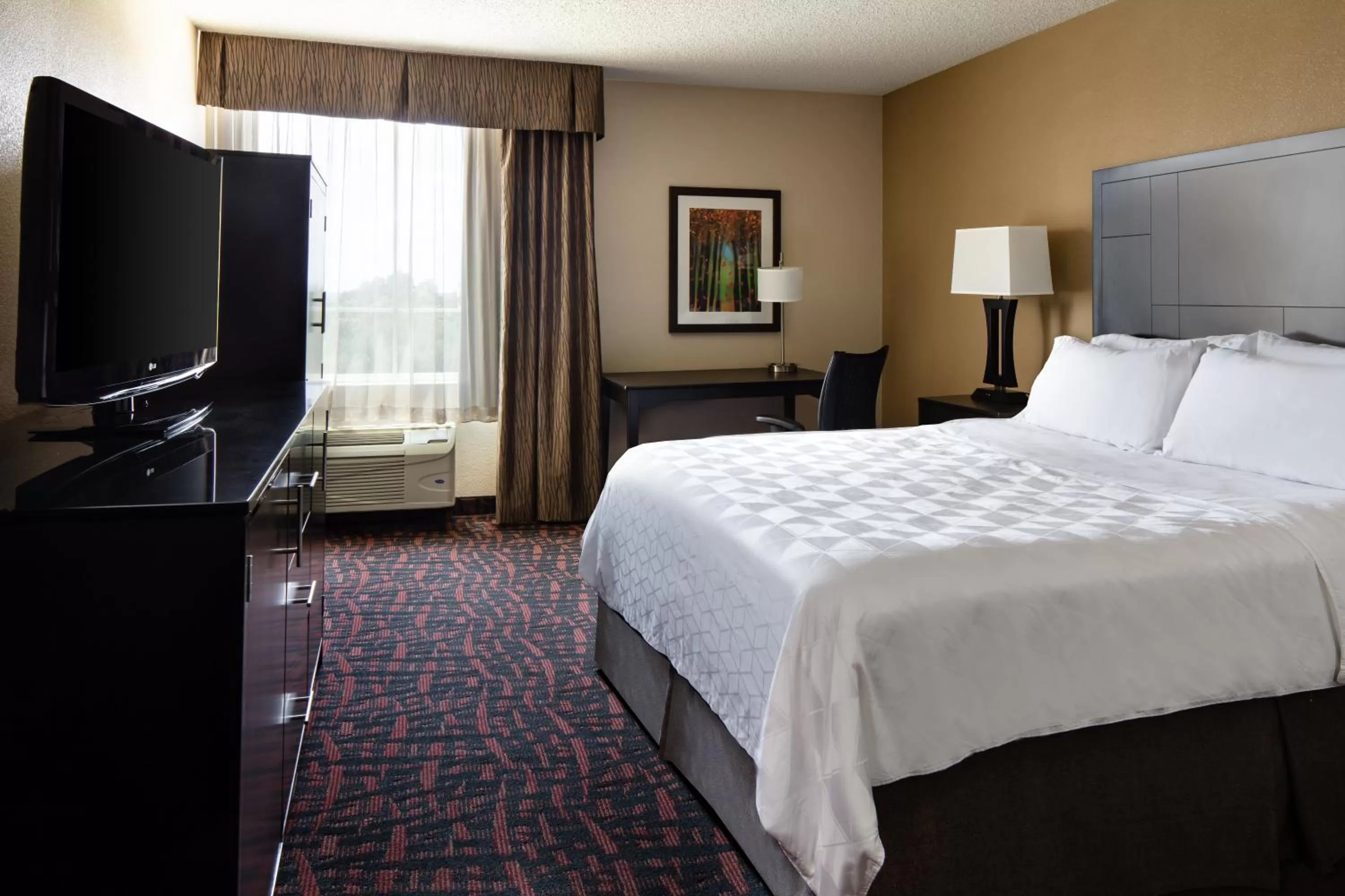 Photo of the whole room, Bed in Holiday Inn Wichita East I-35 by IHG