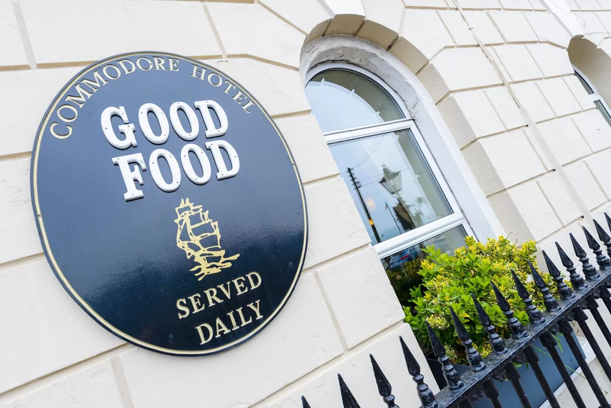 Property logo or sign in Commodore Hotel