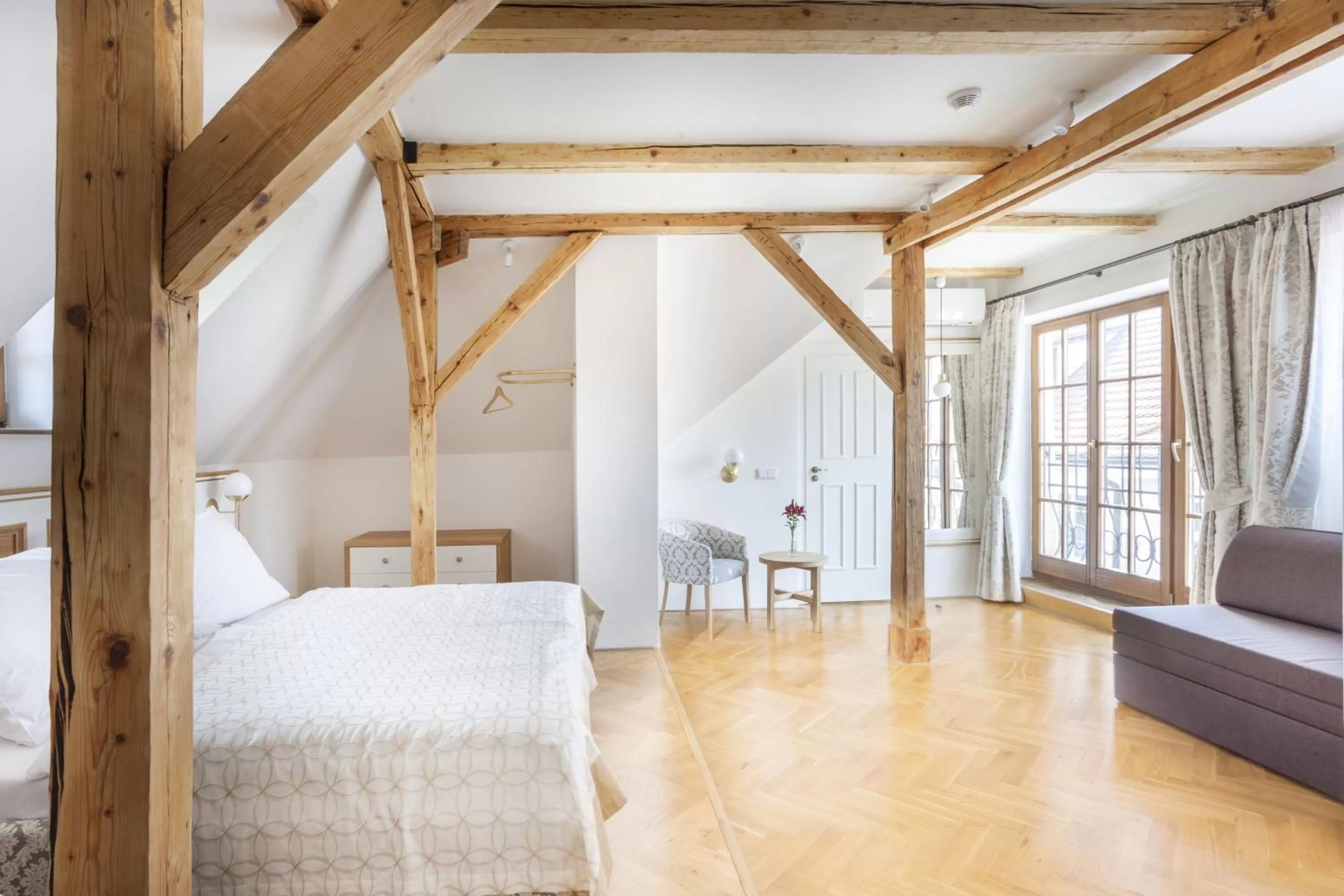 Living room, Bed in Hotel At the Golden Scissors