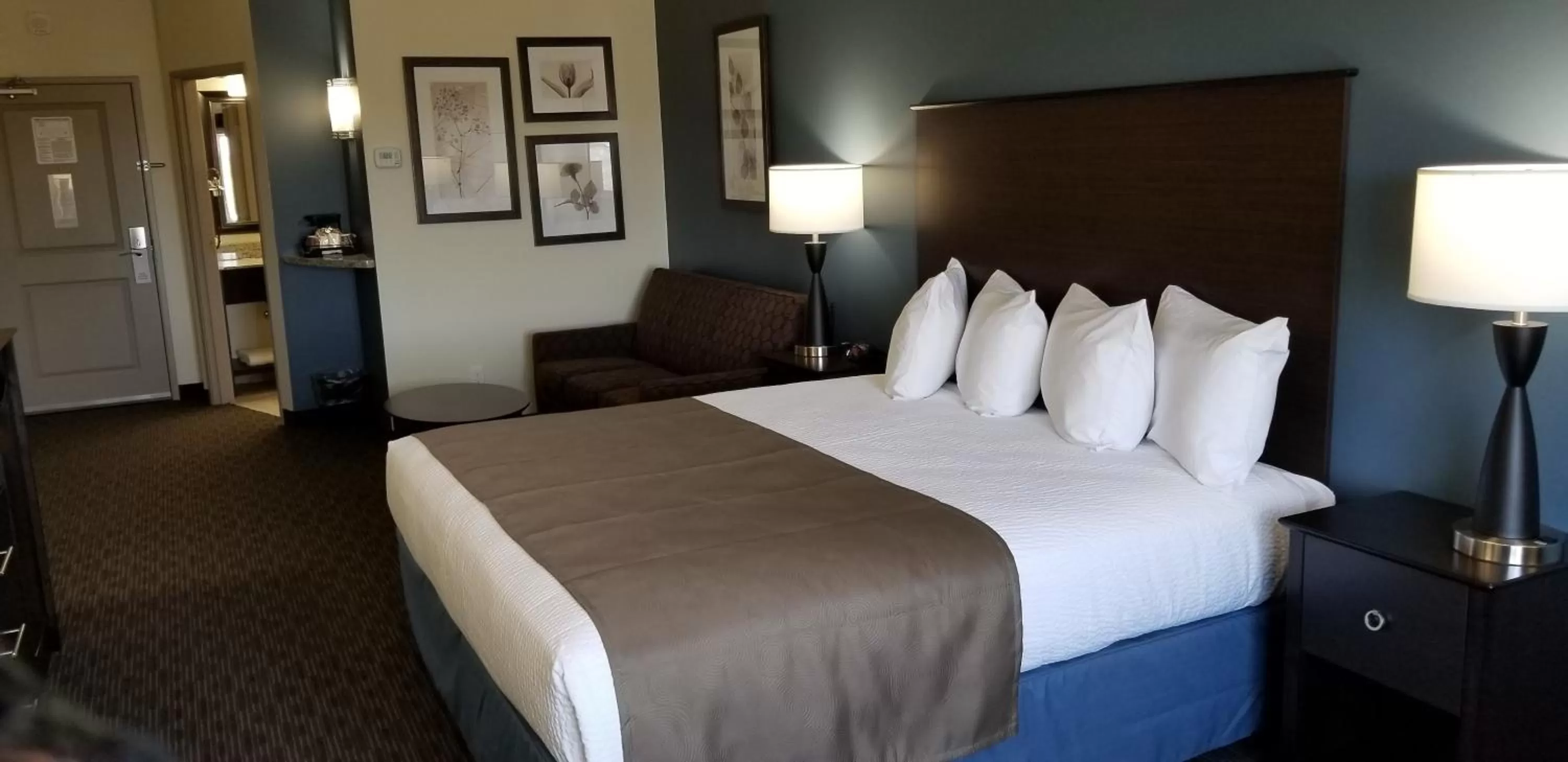 Bed in AmericInn by Wyndham Sioux Falls North