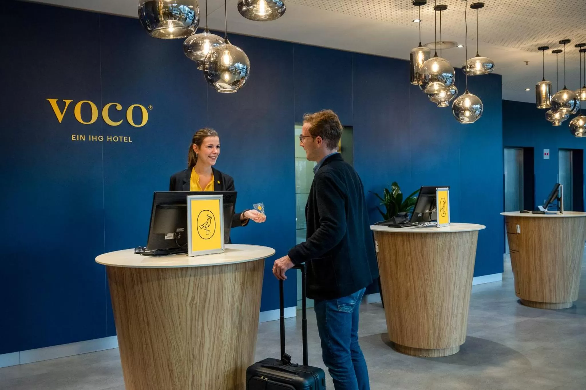 Lobby or reception in voco Dusseldorf Seestern by IHG