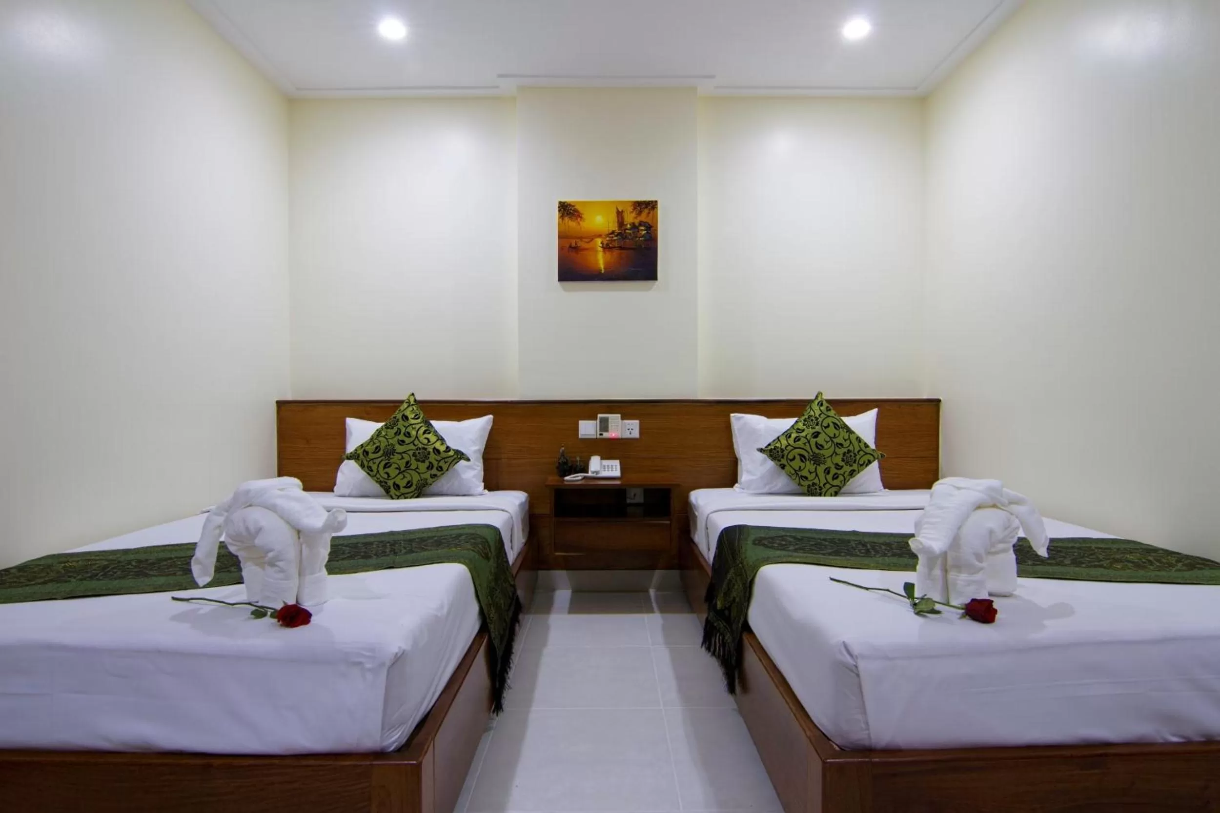 Bed in Rose Emerald Hotel