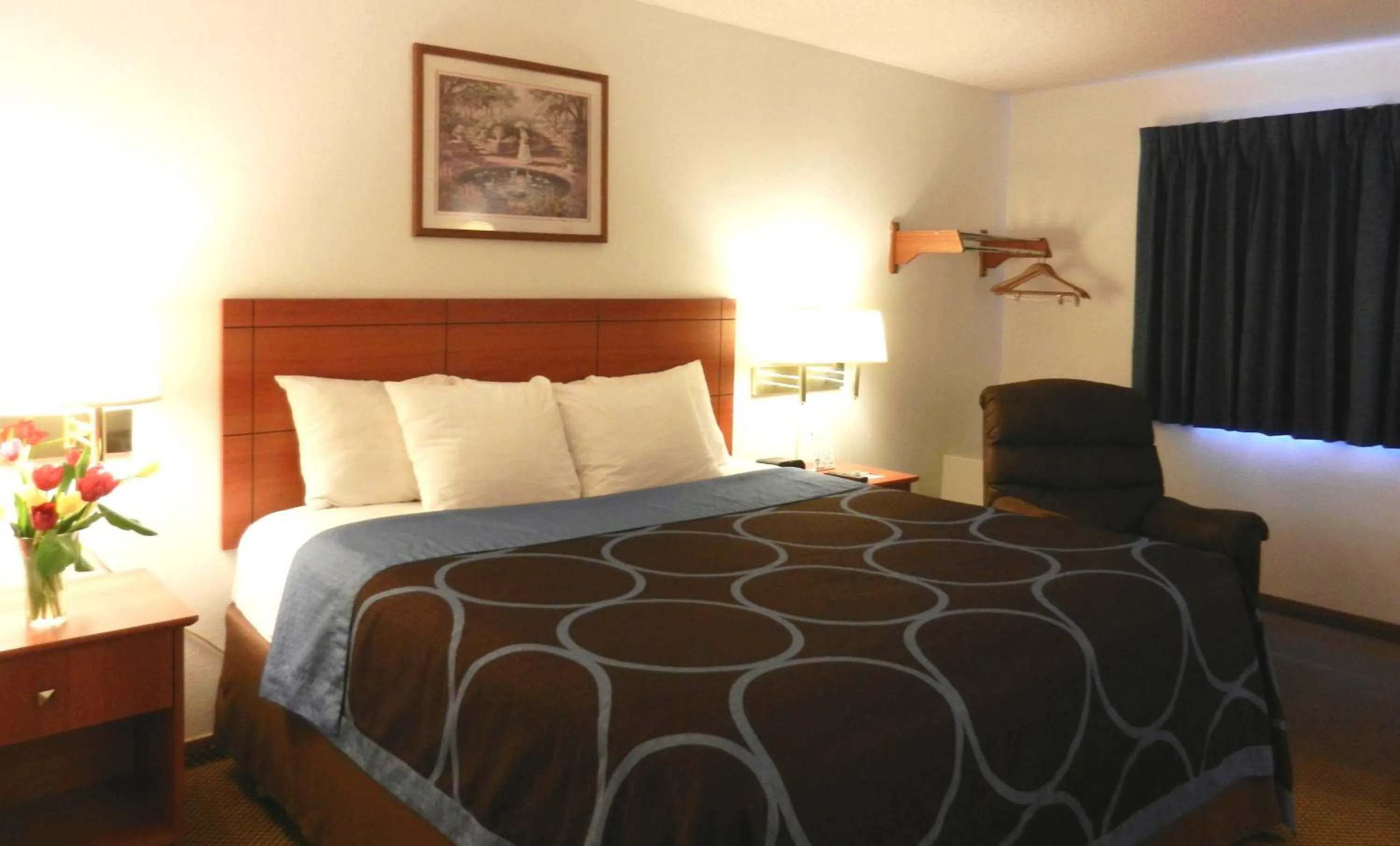Bed in Super 8 by Wyndham Manhattan KS
