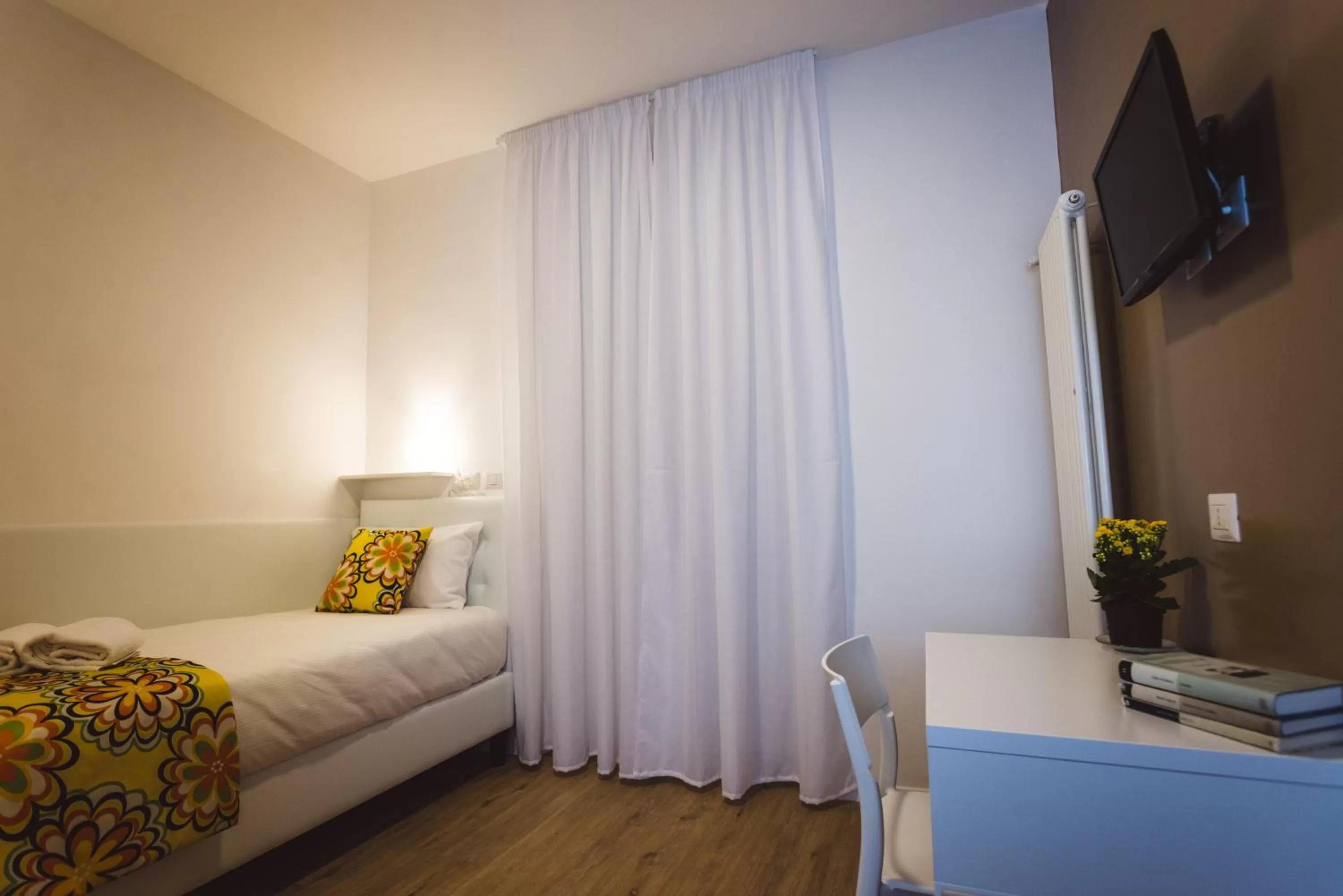 Bed in Angelina Rooms in Rome