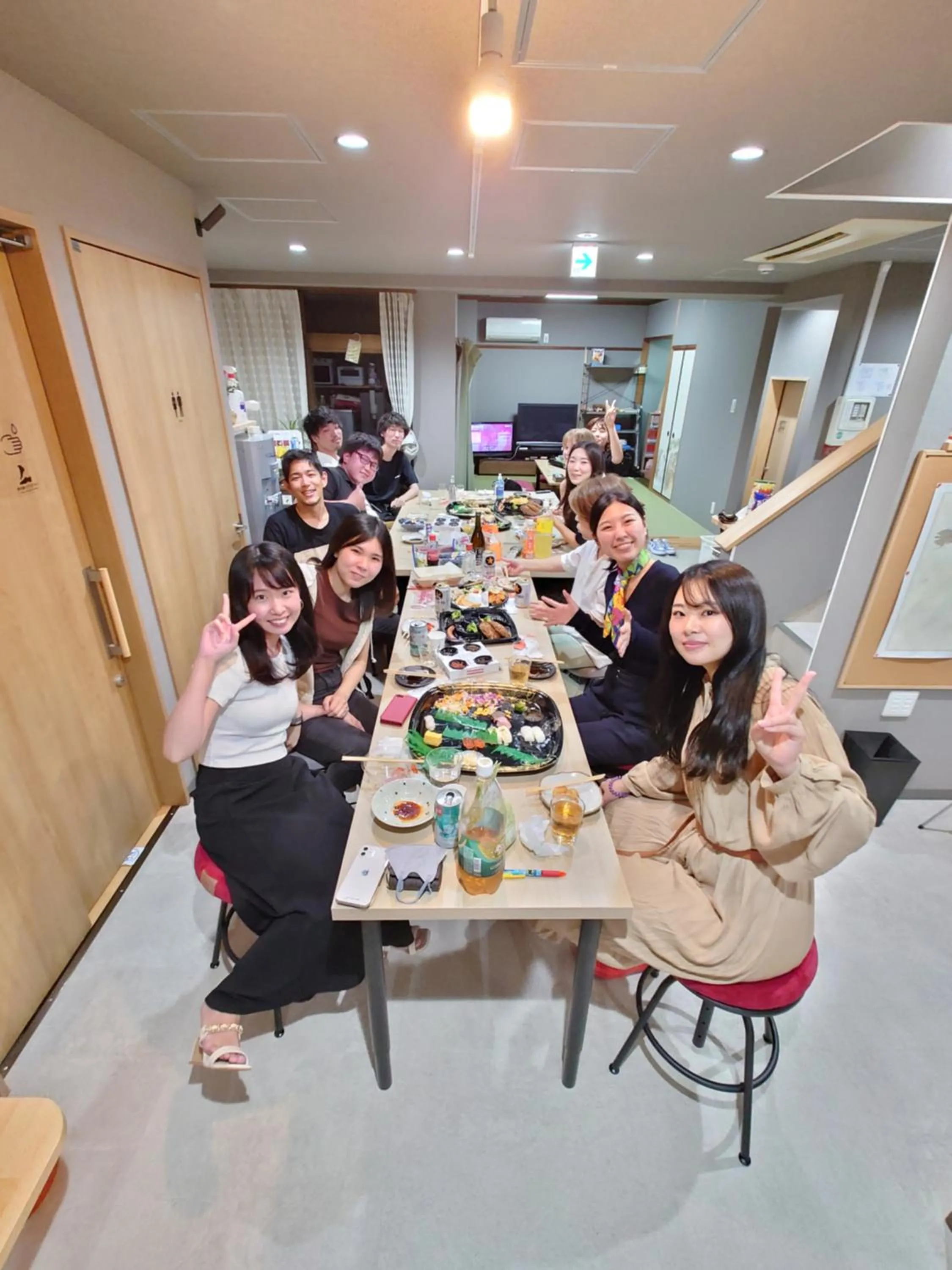 Communal lounge/ TV room in Stay Inn KOTO