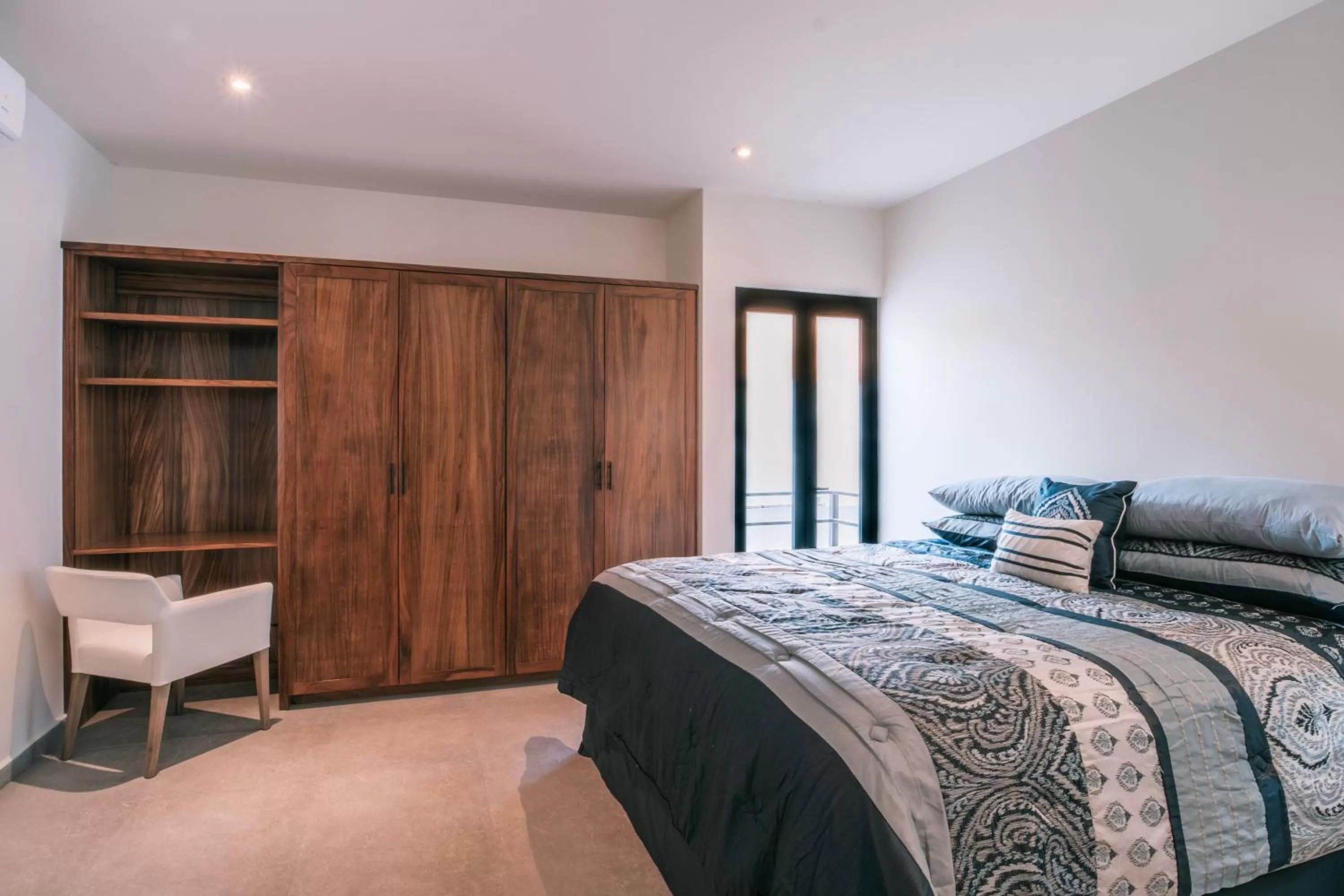 Bed in Cerritos Surf Residences