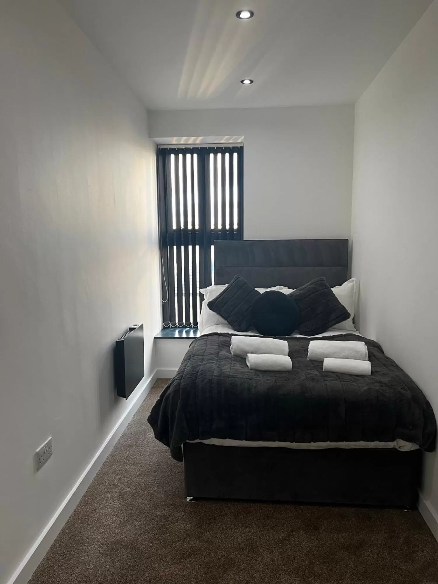 Bed in Spire Accommodations Ltd