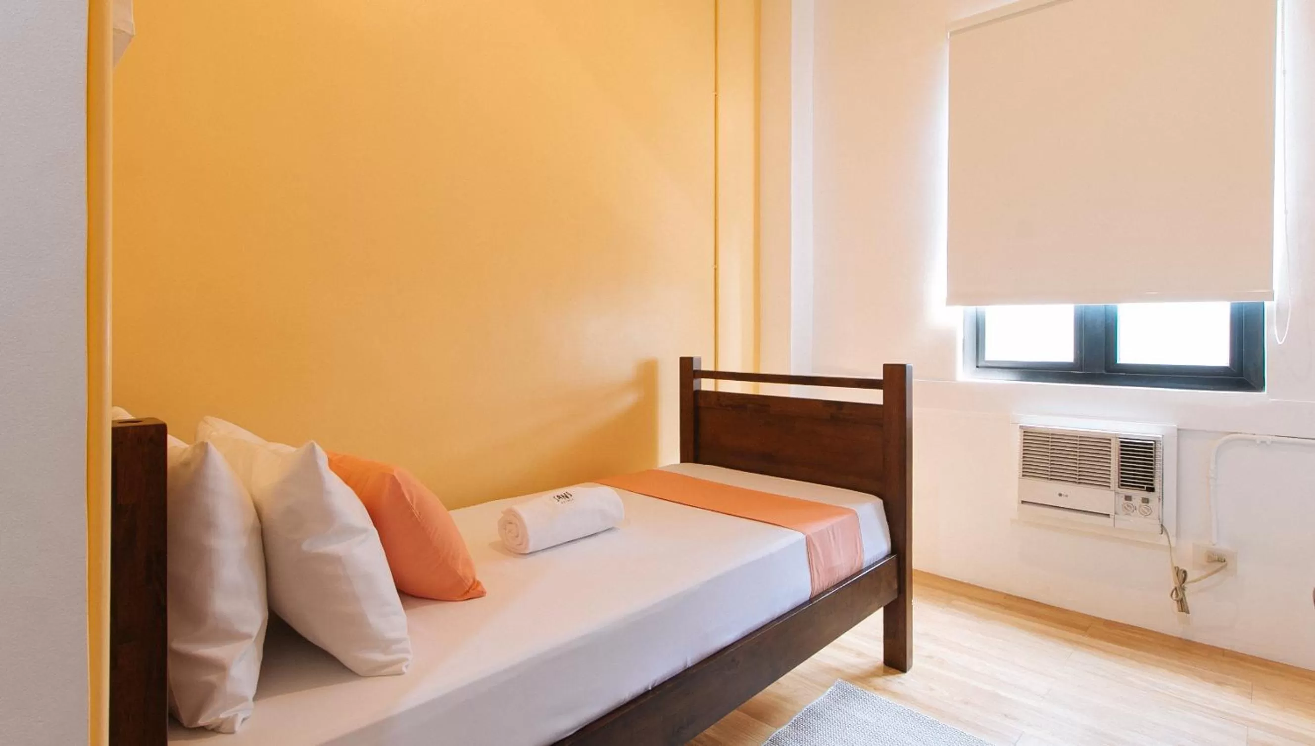 Bed in Sans Hotel Laperal Manila