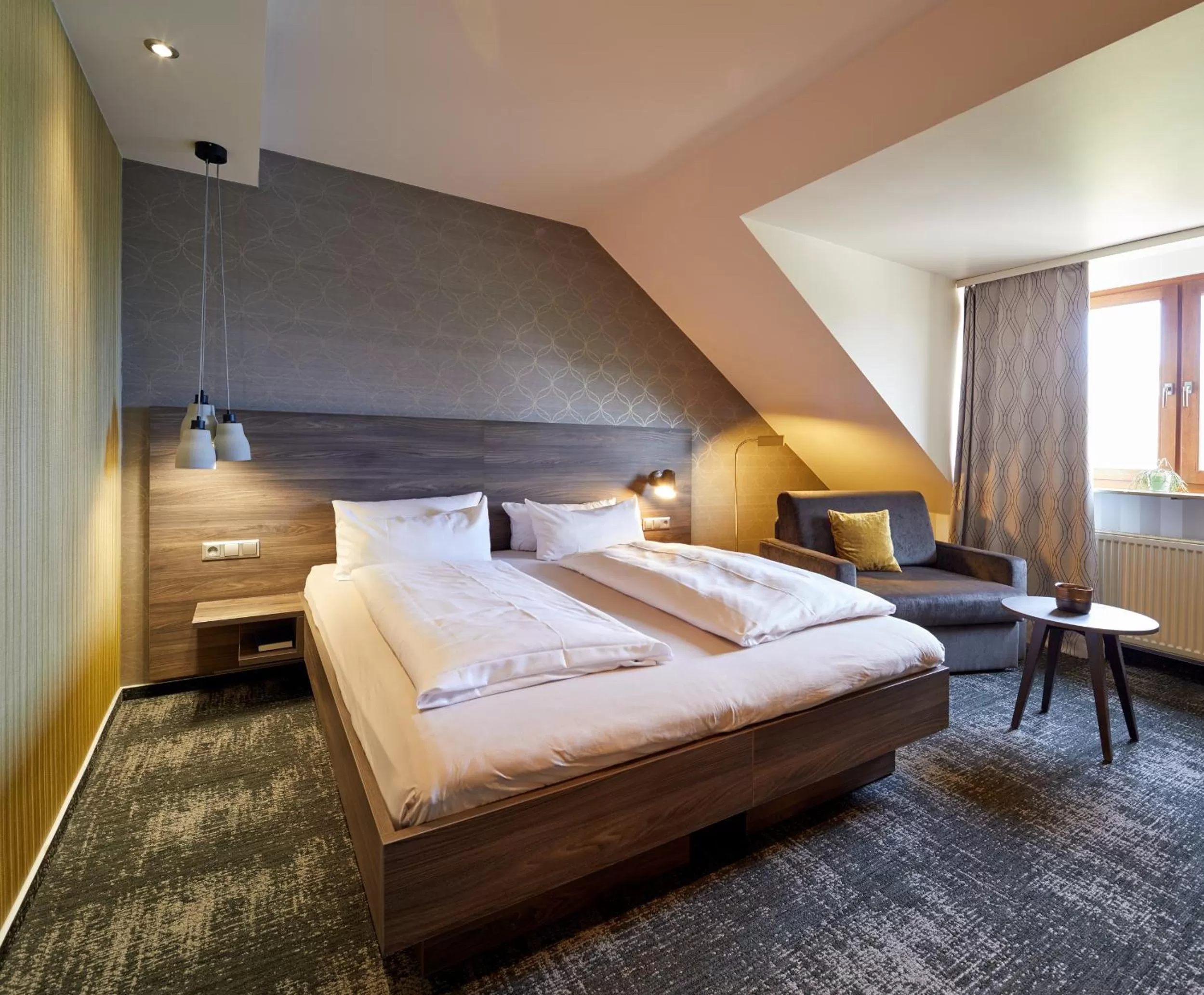 Living room, Bed in NaturKulturHotel Stumpf