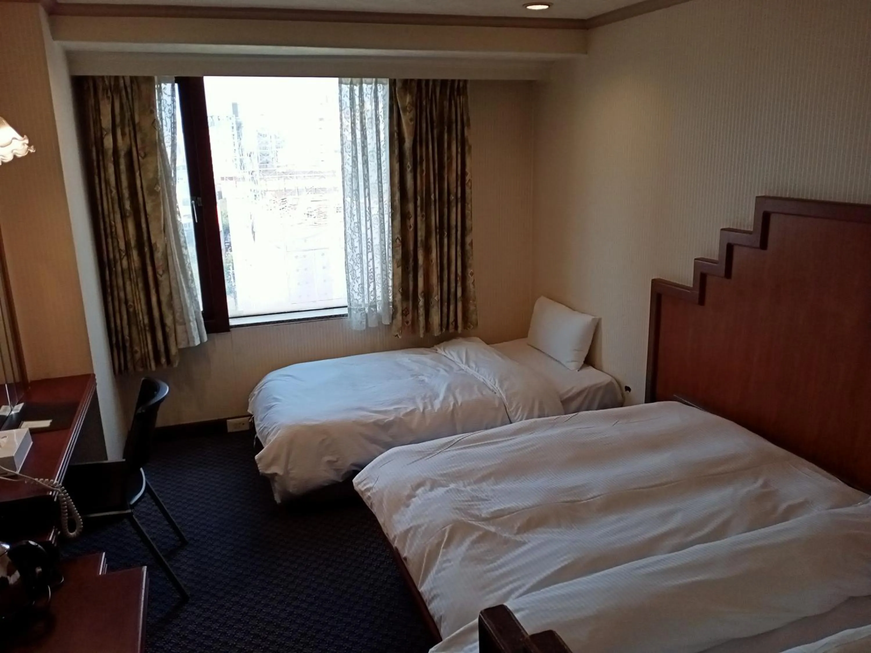 Bed in Chungli Business Hotel