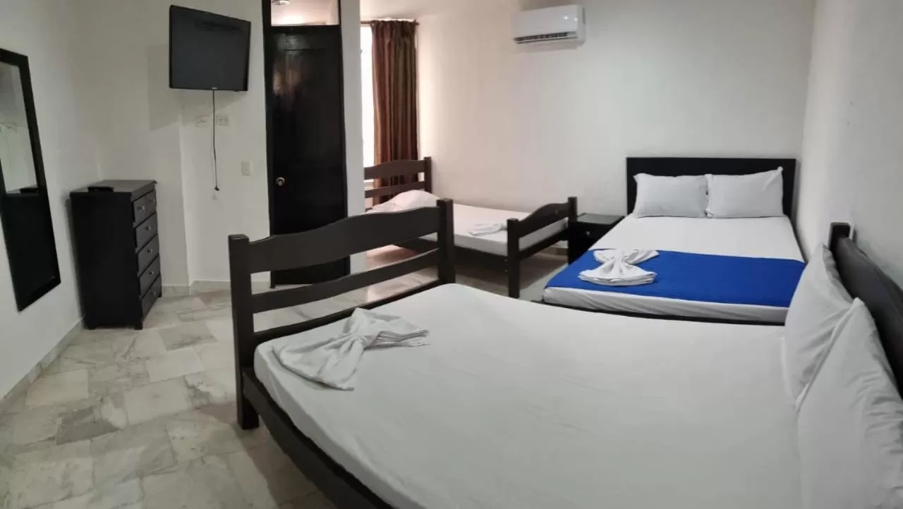 Bed in Blue Star Hotel