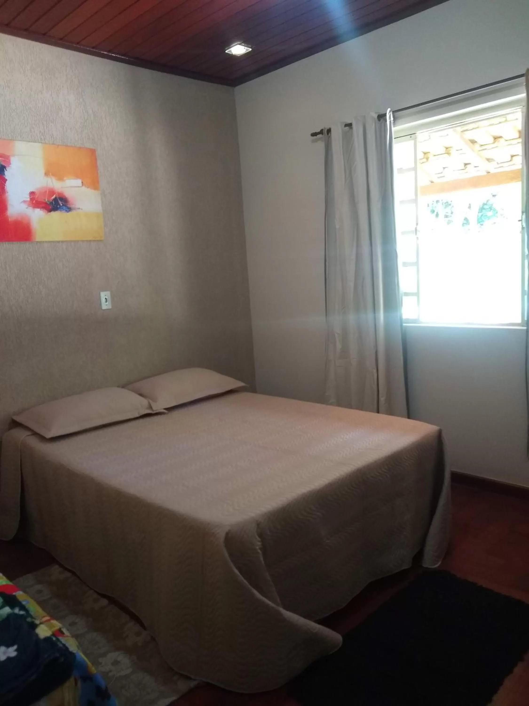 Bed in Pousada do Ribeirão