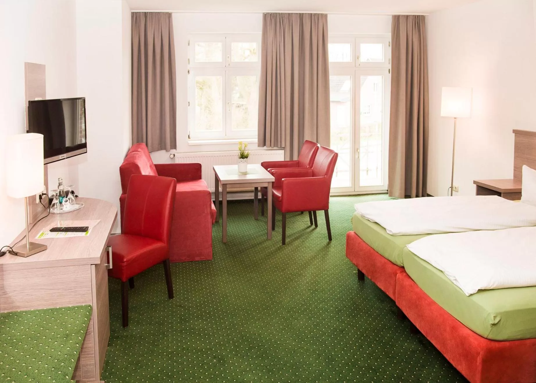 Communal lounge/ TV room, Bed in Gasthof Scharfe Kurve