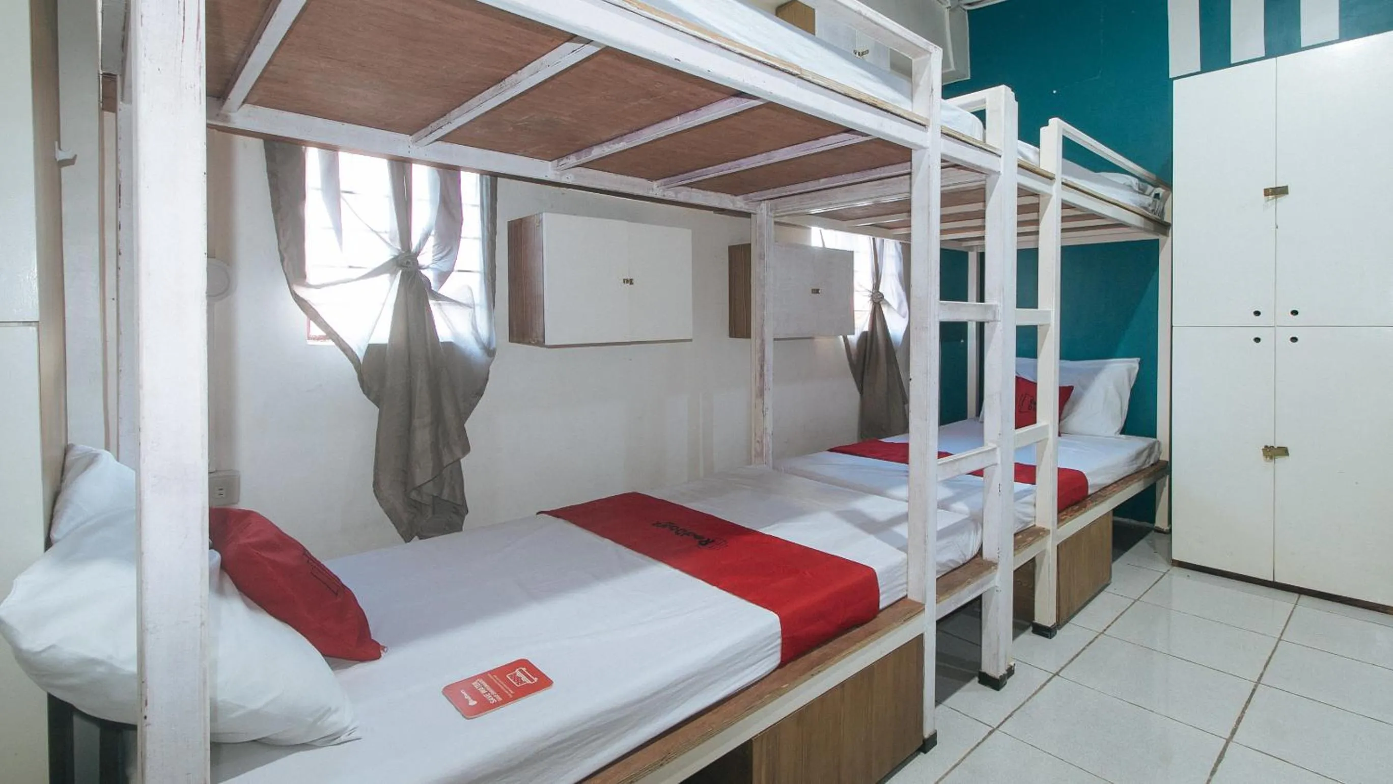 bunk bed, Bed in RedDoorz at Crowne One Condo