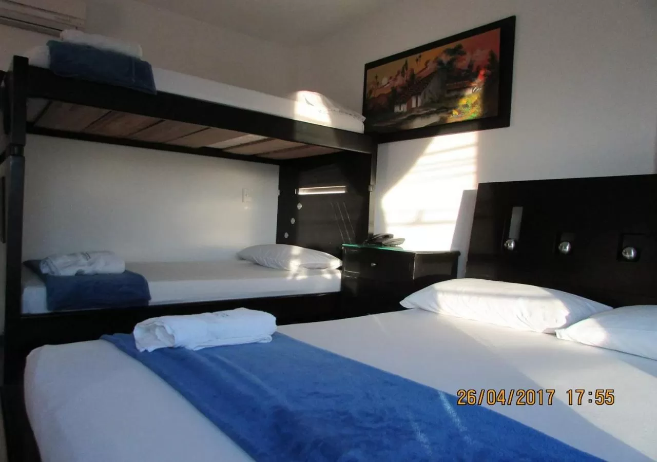 Bed in Hotel Palmeras De Mariana