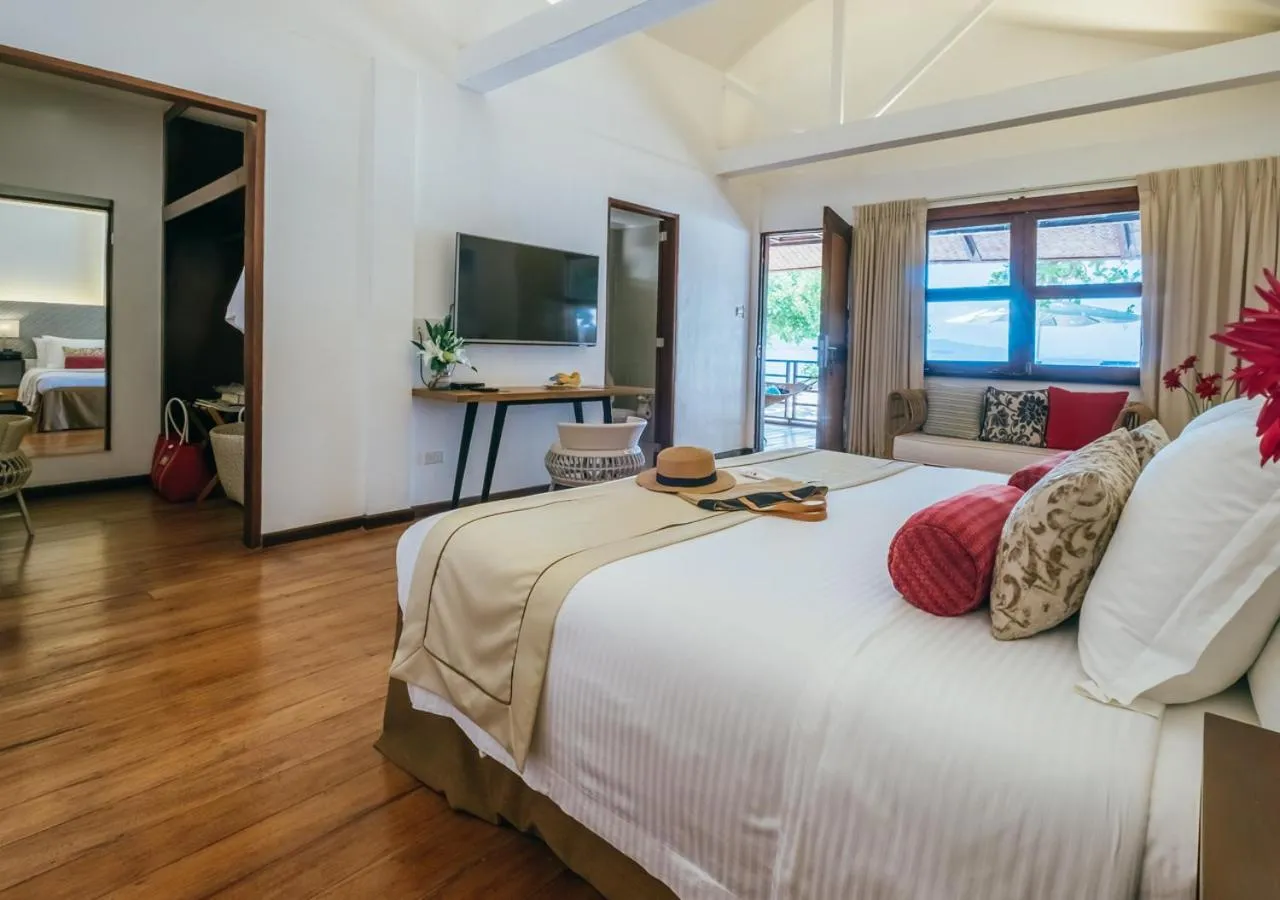 Photo of the whole room, Bed in Discovery Coron formerly Club Paradise Palawan